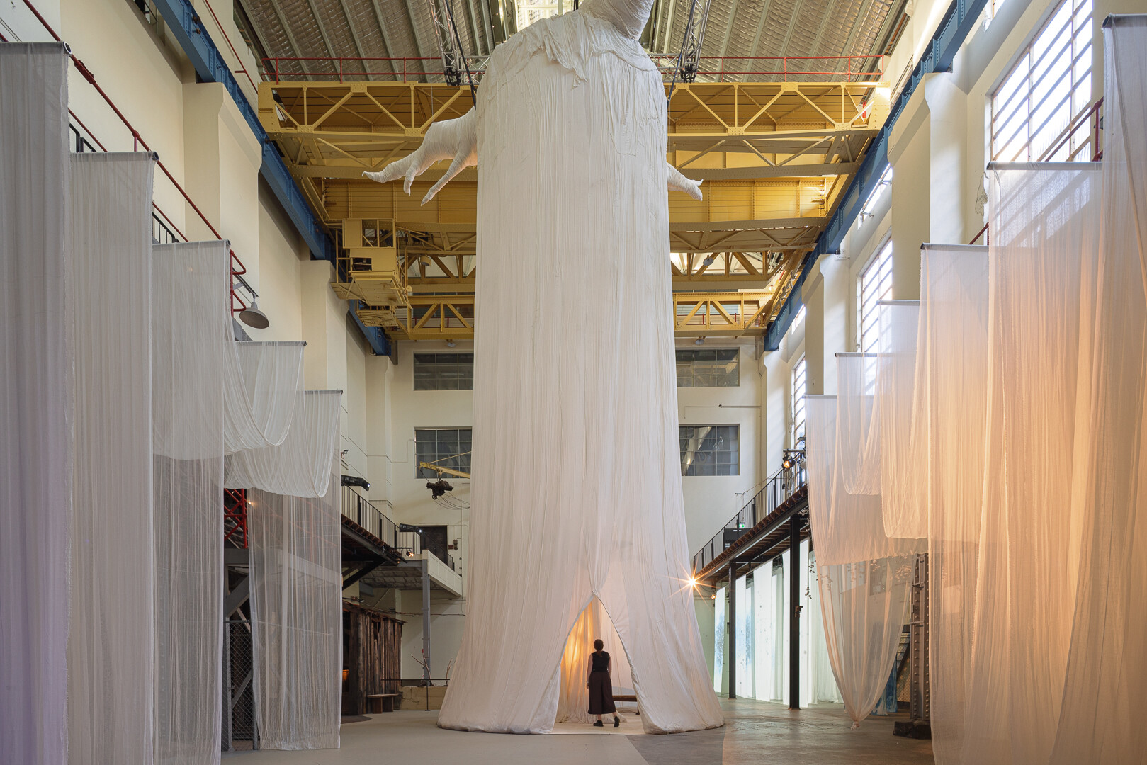 <p>Nikesha Breeze, <em>Living Histories</em>, 2026, cotton gauze, wood, steel, cyanotype prints, furniture, sound, video projection, paper. Commissioned by the Biennale of Sydney. Courtesy of the artist. Photograph: Document Photography</p>
