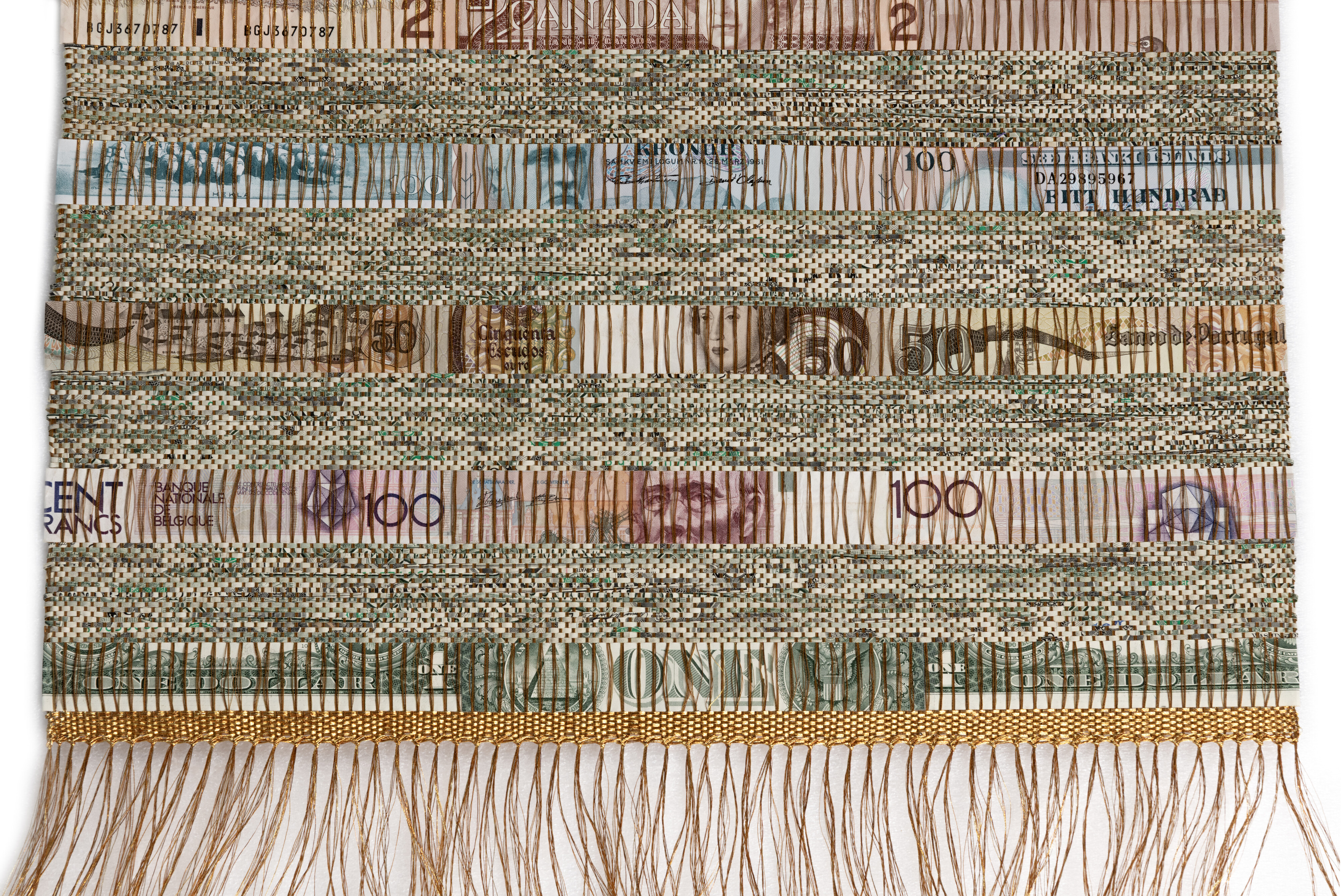 <p>Detail of Abdullah M.I. Syed, <em>NATO Rug</em>, 2026, handloomed found shredded US dollars and hand-cut uncirculated banknotes of 13 NATO founding member nations, gold thread, perspex, Tamworth Regional Gallery. Woven by Janet Maughan. Photo: Courtesy the artist and Miranda Heckenberg.</p>