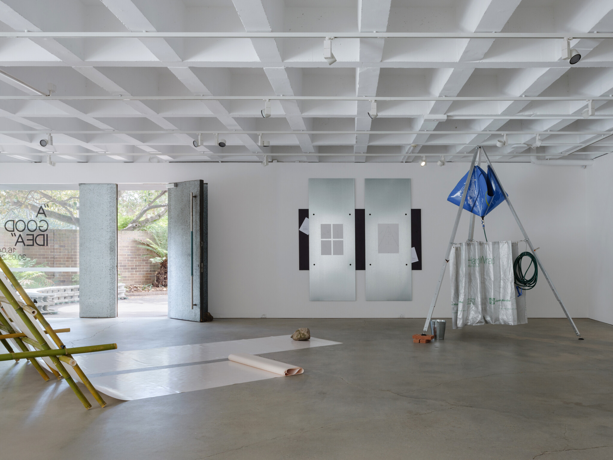 <p>Installation view of <em>A Good Idea</em>, 2025. Workshop 4 (W04): Shalini Rautela, Tess Bell, Lindsay Mulligan, Rowan Lear, and Samuel Murnane (under the supervision of BAST as a part of a program run in collaboration with Guillermo Fernández-Abascal at Mori Lewisham), <em>Washing</em>, 2024. Theo De Meyer and Stefanie Everaert, <em>Your Drawing May Be Small, But Not Your Frame</em>, featuring drawings of various projects from the BAST workshop, 2024. Photo: Hamish McIntosh.</p>