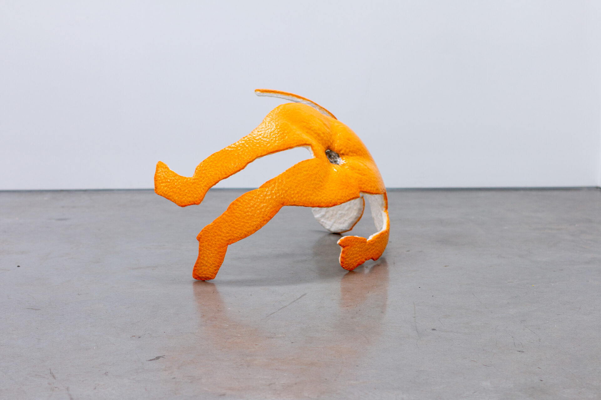 <p>Installation view of Darcey Bella Arnold, <em>The Orange is Orange (figure)</em>, 2024, polystyrene foam, polyurethane polymer, synthetic polymer, cotton fibre, flocking, varnish, 57 x 81 x 100 cm, 1301SW, Sydney. Image courtesy of the artist and 1301SW.</p>