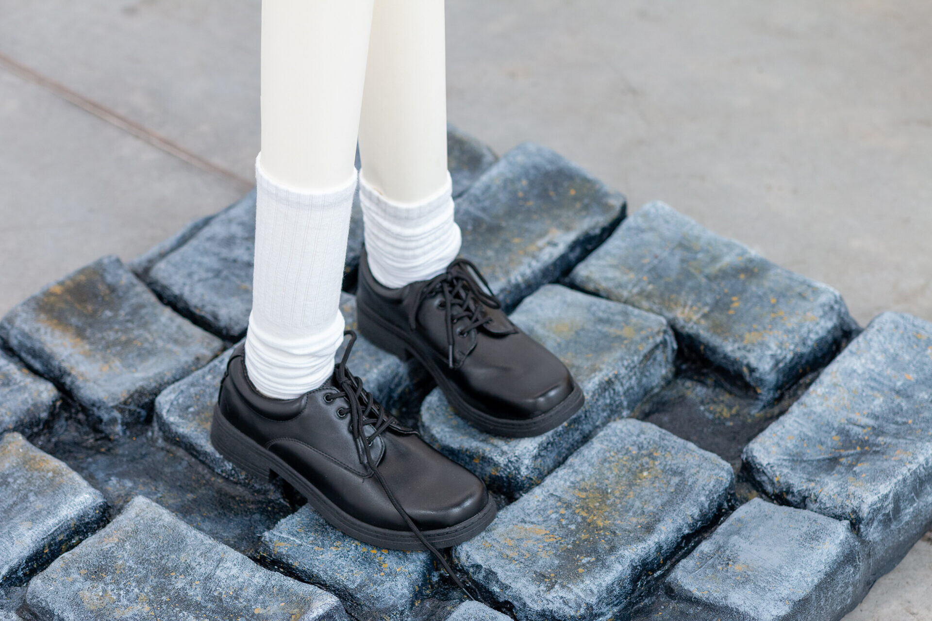 <p>Installation view of Alex Gawronski, <em>Completion</em>, 2015/2025 (detail), plaster, chicken wire, paint, resin, shoes, socks, cardboard, 68 x 82 x 82 cm, 1301SW, Sydney. Image courtesy of the artist and 1301SW.</p>