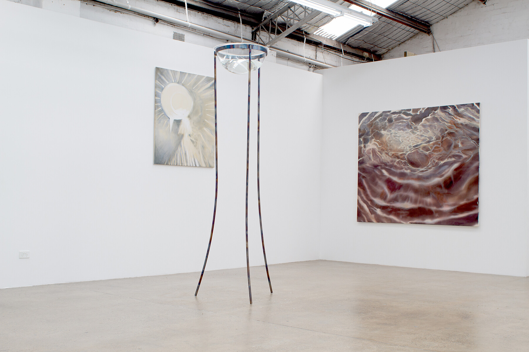 <p>Installation view of Clara Joyce <em>Open Caustic (1)</em>, 2024 (left); <em>Water Vision Instrument</em>, 2023. Perspex, water, steel frame. (centre); and <em>Breathing and Chaos</em>, 2024 (right). Photo: SYRUP and Taya Corrigan.</p>