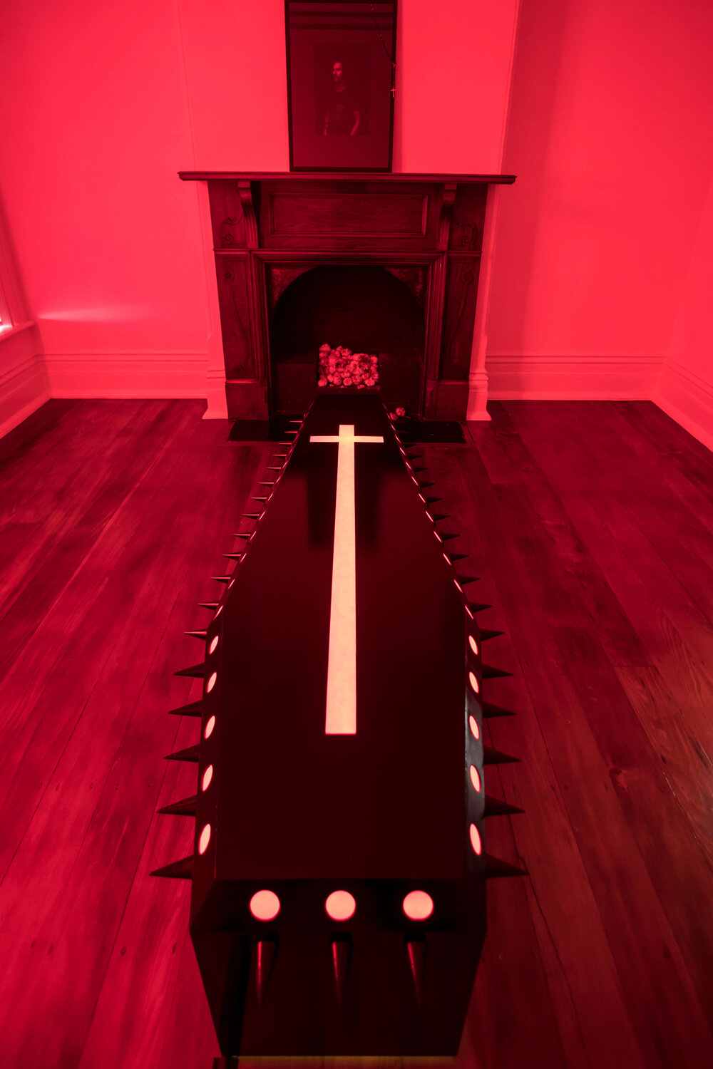 Diego Ramirez, <em>Eternal Arrival</em>, 2019. Coffin-shaped lightbox. Image courtesy of the artist.