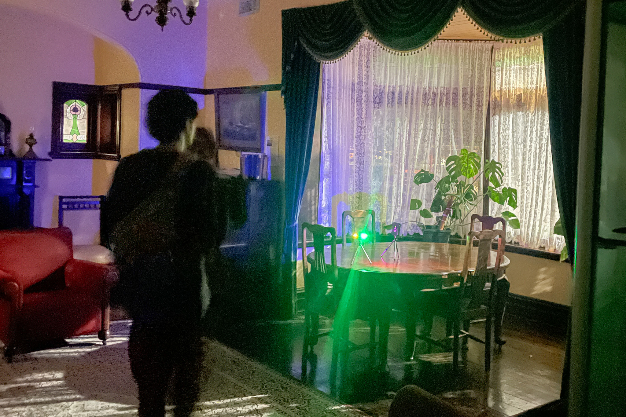 Monitoring the drawing room with a sensor during the paranormal investigation. Photo by Daniel Kotsimbos.