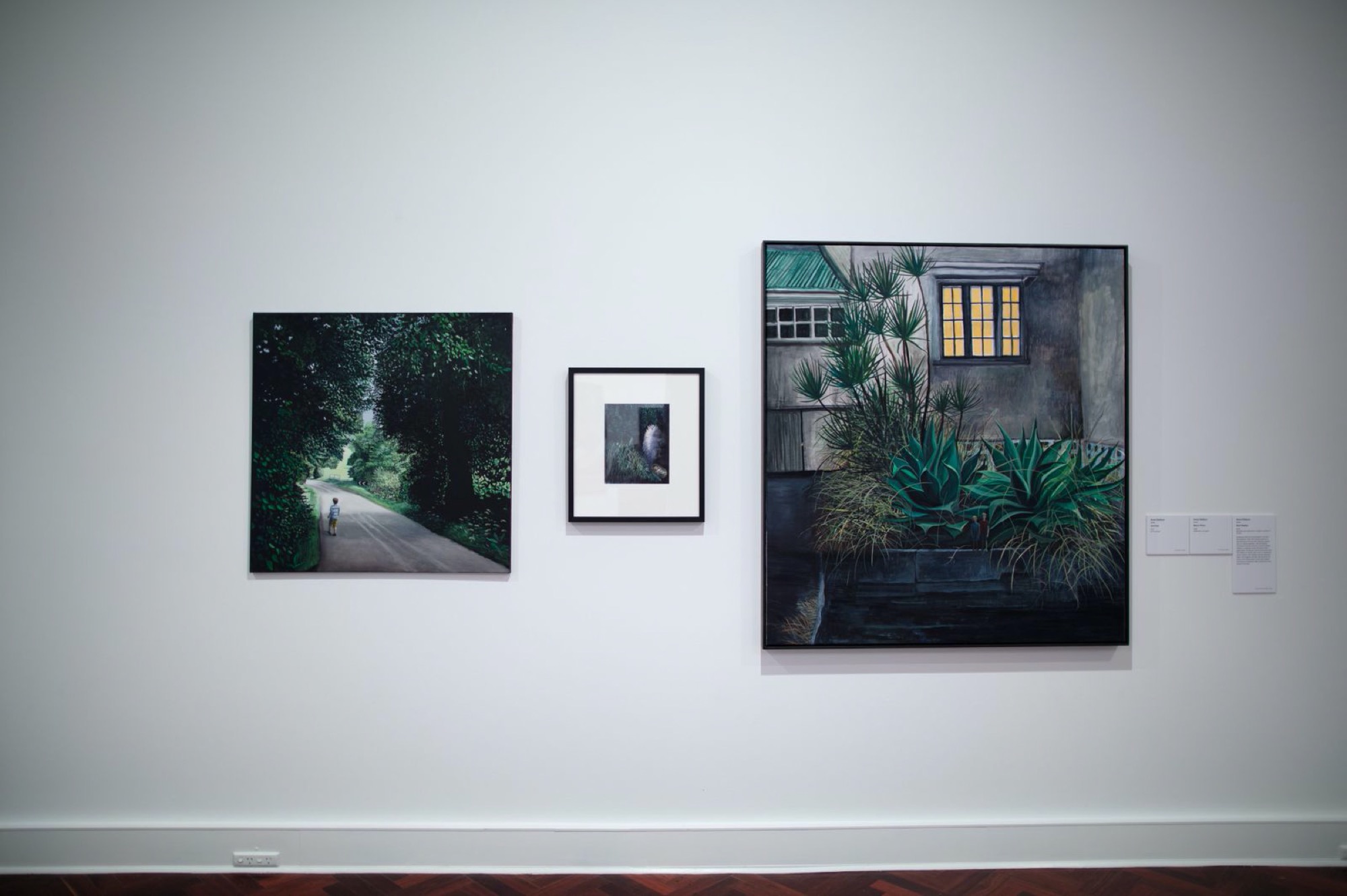 (left to right) Anne Wallace, Journey, 2013. Oil on canvas, 100 x 100cm; Anne Wallace Moon River, 2008. Oil on canvas, 30 x 22cm; Anne Wallace, Boo Radley, 2018. Gouache and watercolour on paper mounted on canvas, 142 x 130 cm. Courtesy of the Art Gallery of Ballarat.