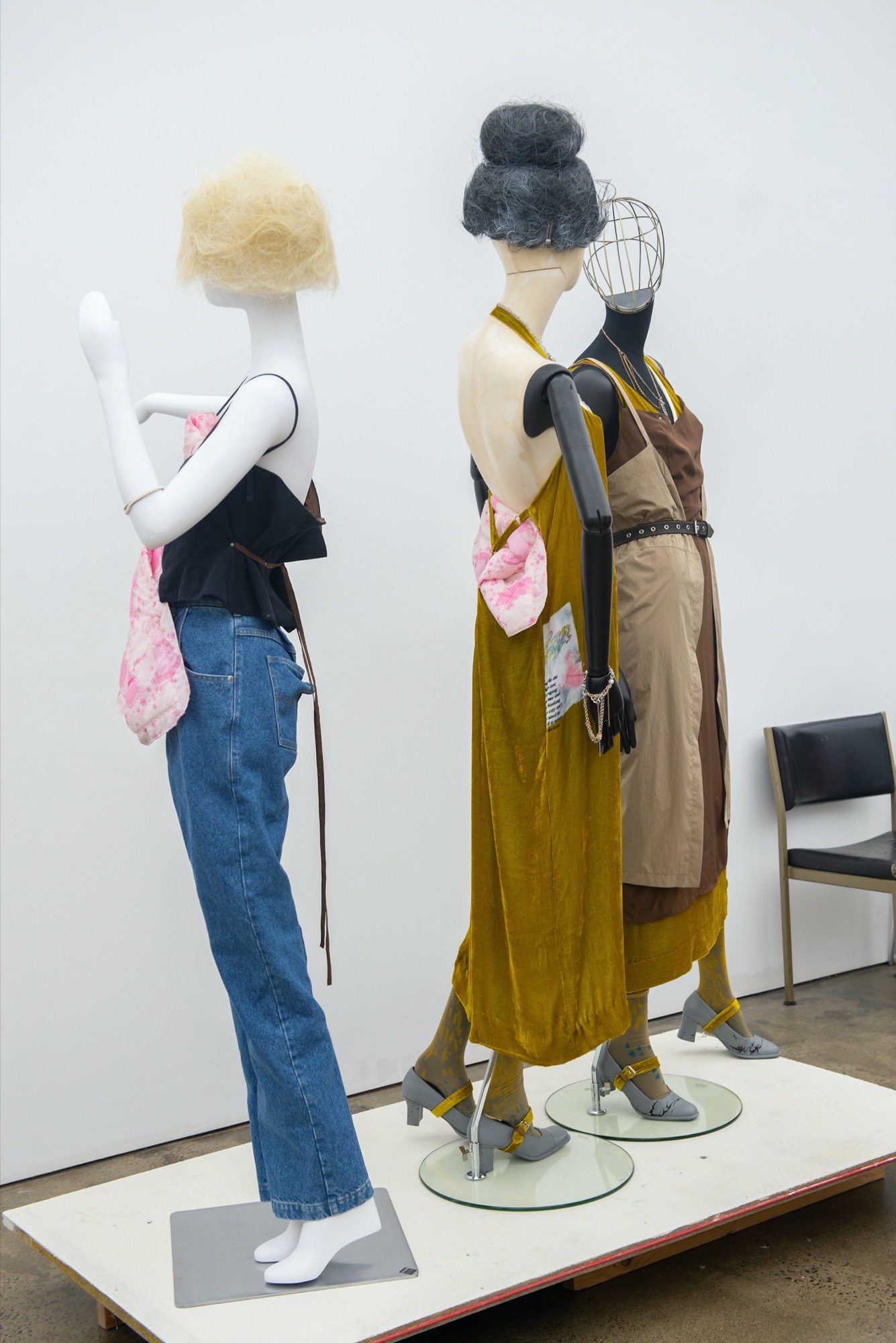 Tallulah Storm, 2018, Mustard velvet, brown silk habutai and pale olive nylon layered slip dresses with charcoal denim belt; Tallulah Storm, 2018, Mustard velvet slip dress padded with children’s quilt; Tallulah Storm, 2018, Navy drill camisole padded with children’s quilt, refitted classic blue jeans with layered fly.