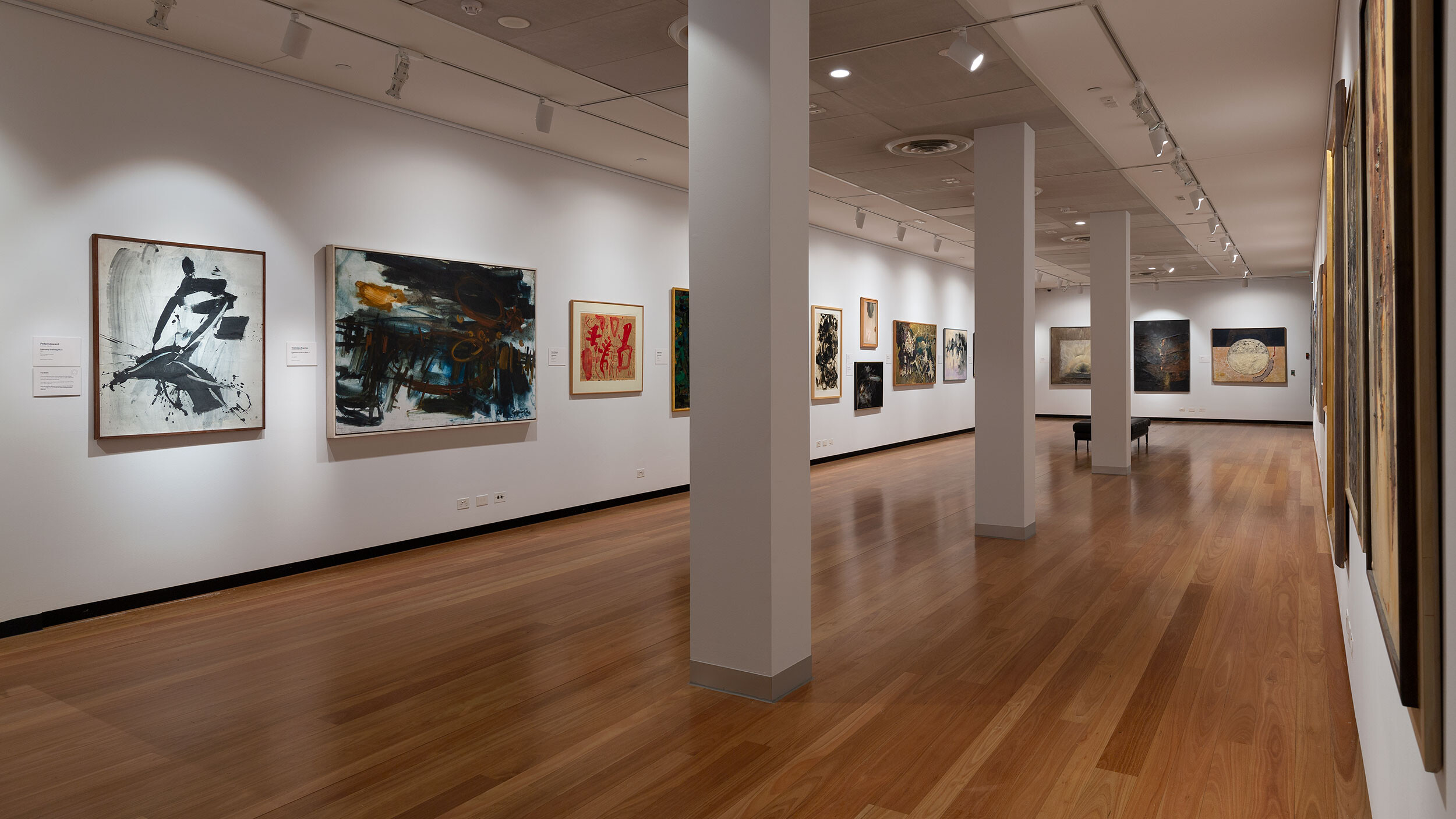 <p>Installation shot <em>Aspects of Abstraction</em> with Asher Bilu, <em>Lit (Consciousness)</em> (1968-70), Frank Hodgkinson, <em>Deya</em> (1960), and Elwyn Lynn,<em> Afloat </em>(1967) on far wall. Photo: Christian Capurro</p>