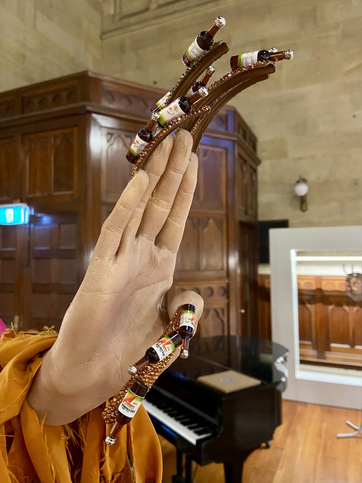 Nathan Beard, <em>Limp-wristed Gesture (ii)</em>, 2020 Silicone, found objects, acrylic nails, Swarovski elements, cotton, wax, Fenty Beauty, Tom Ford Beauty, nail polish, painted steel. Dimensions variable. Courtesy FUTURES