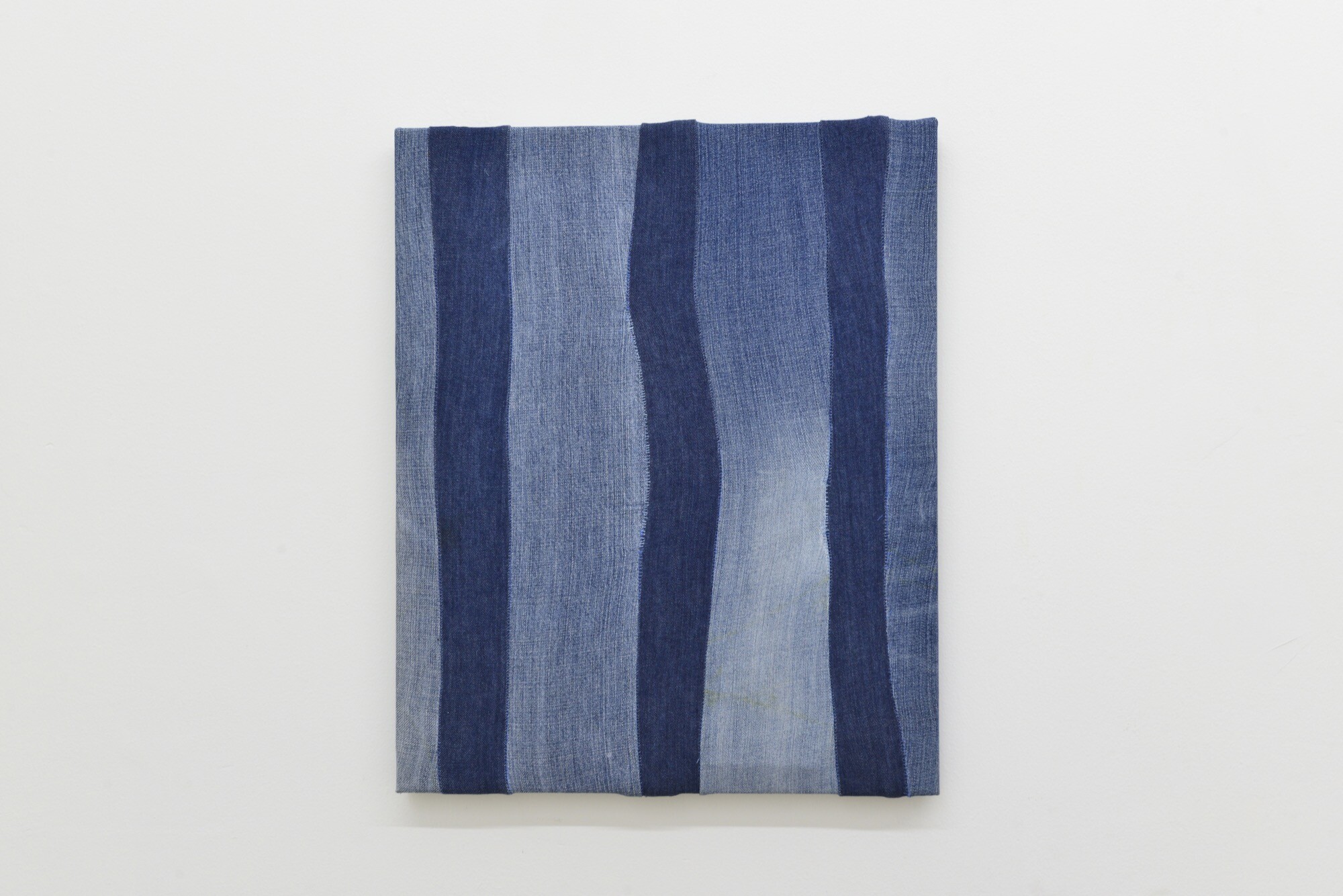 <p>Jane O’Neill, <em>Aquanation,</em> 2023, polyester and cotton on denim on hoop pine stretcher, 55 x 44.5cm. Photo: Void_Melbourne</p>