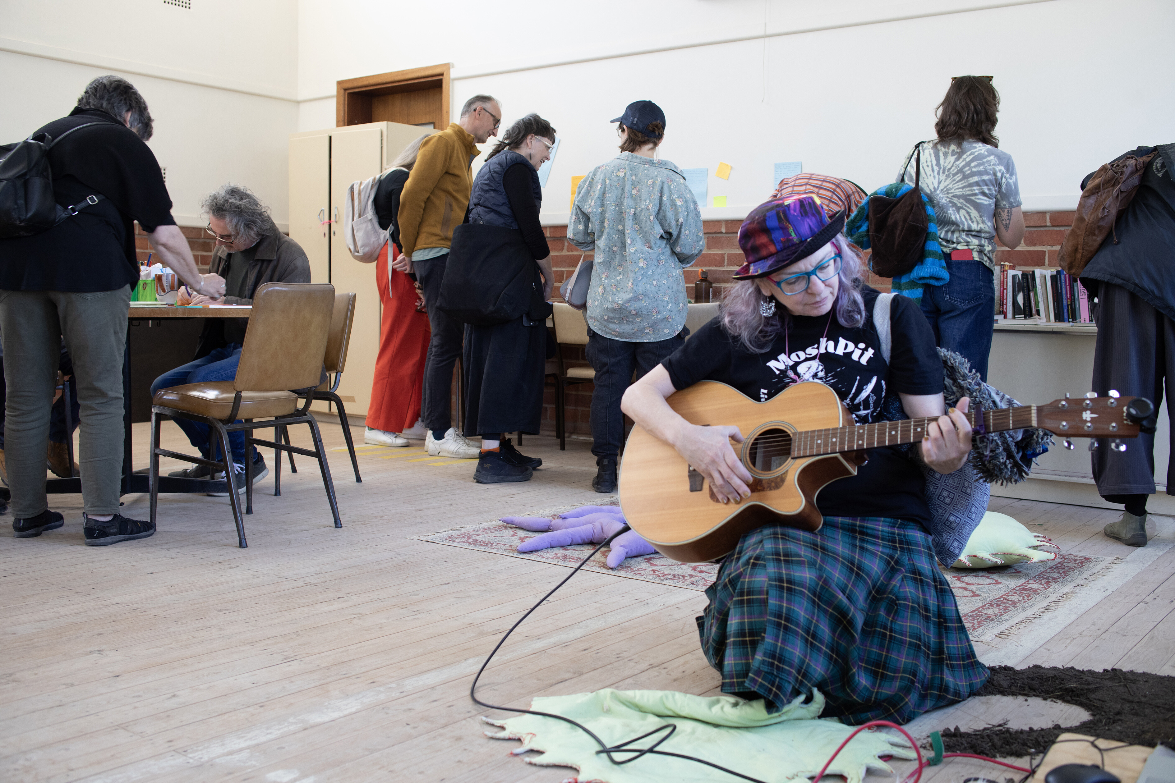 <p>Othy Willis, <em>Rest and Repair Space</em>, 2026, installation with books, rammed earth, instruments, soft sculpture, St Dominic’s Church, Kandos. Photo: Ian Hobbs</p>