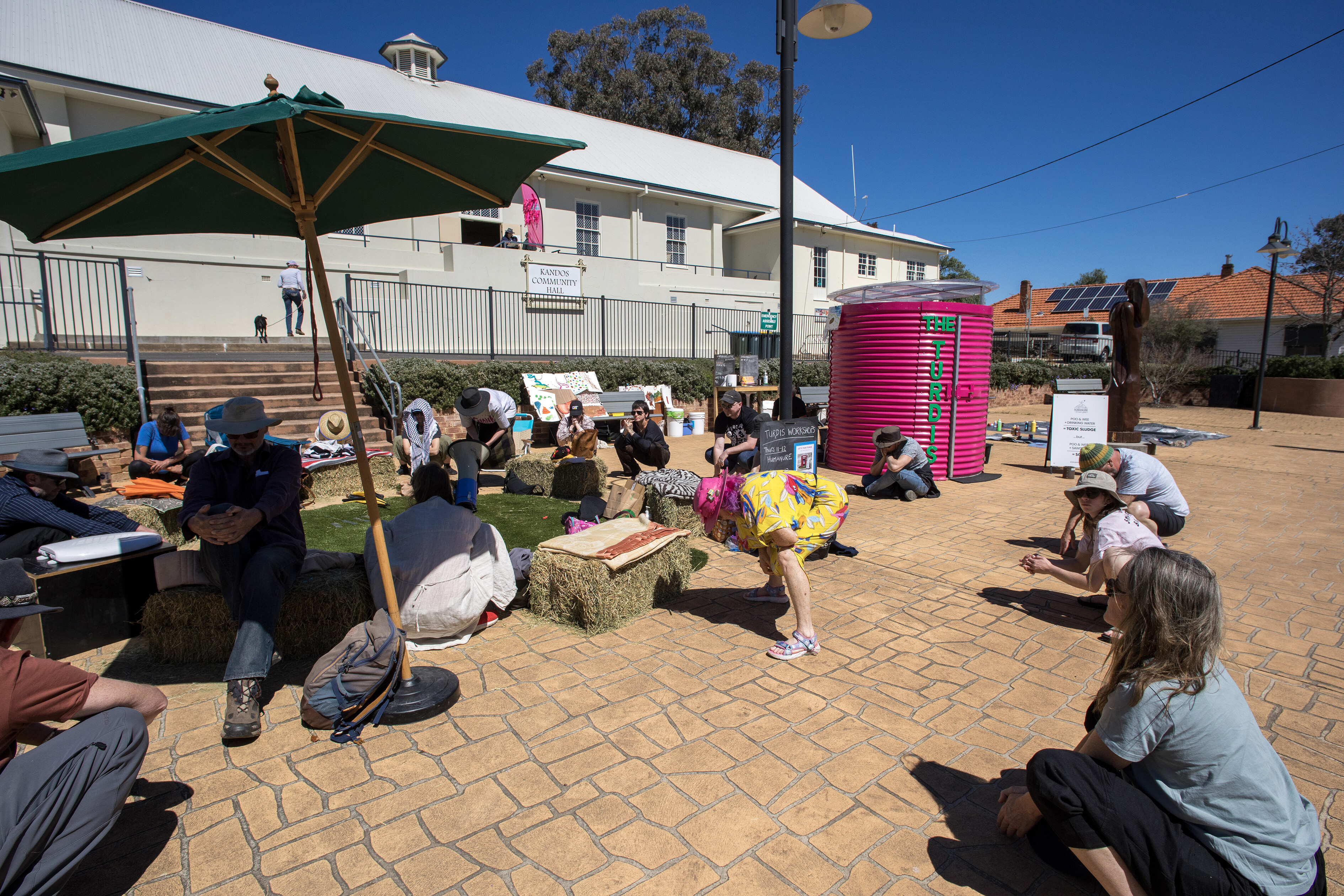 <p>Kim Williams and Lucas Ilhein, <em>Pootopia</em>,<em><em>Conscious Shitting</em></em> workshop led by Gideon/Bumblebee, Kandos Community Centre. Photo: Ian Hobbs</p>