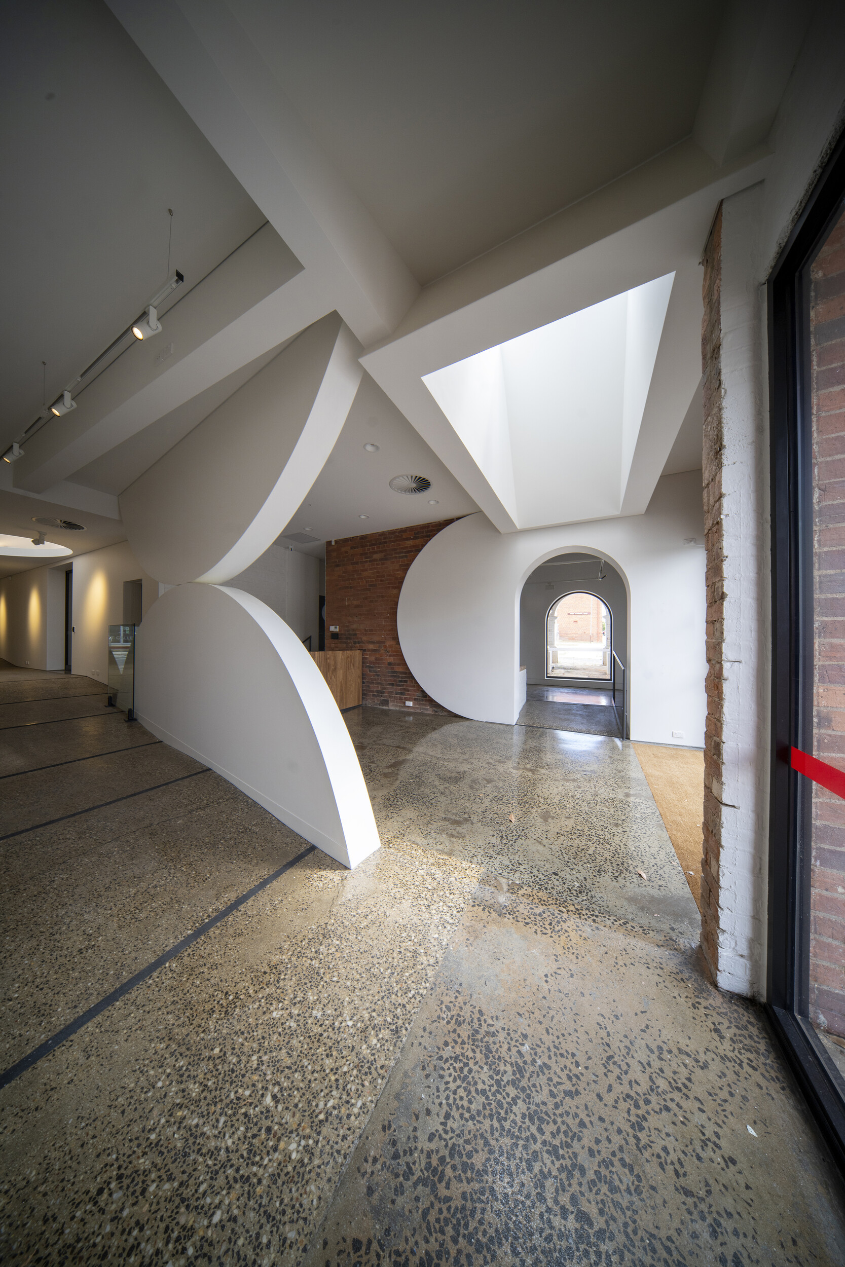 <p>The new entry and reception area of the gallery. Photograph by John Gollings.</p>