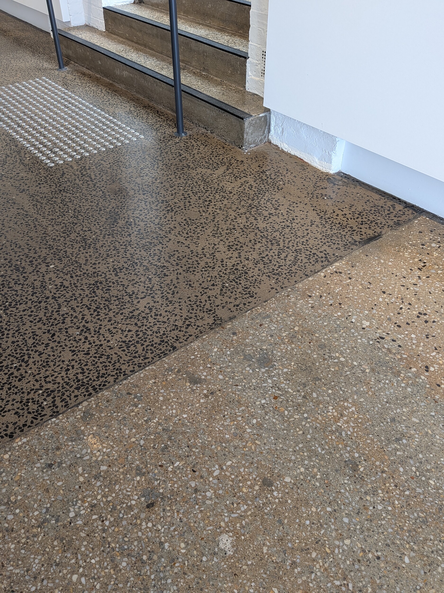 <p>The gallery’s concrete floor is thought to be the original 1861 mix (right), with a later extension in a different mix. Photographs by the author.</p>