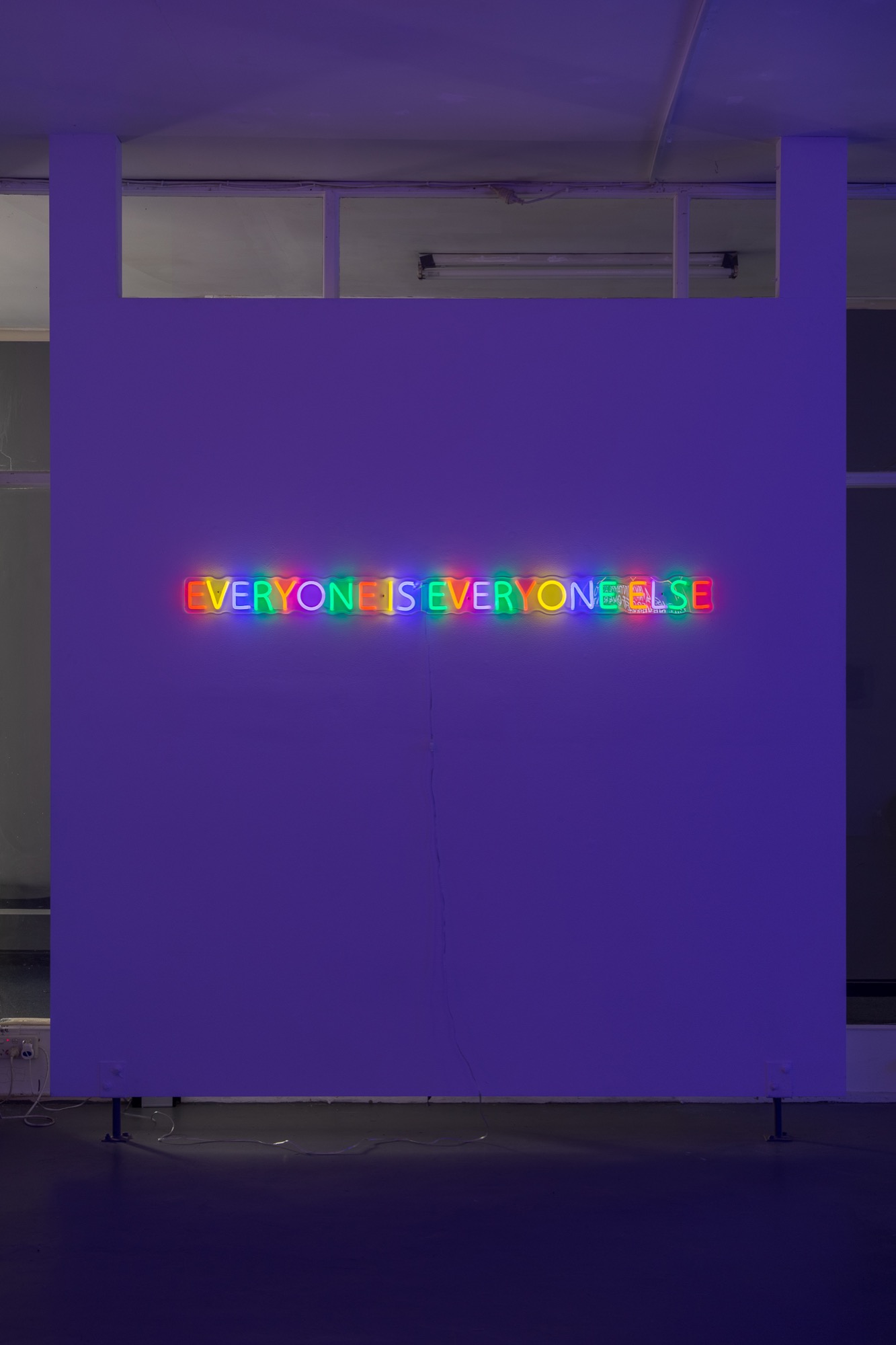 Chunxiao Qu, <em>EVERYONE IS EVERYONE ELSE</em>, 2019, led neon with transparent acrylic frames, 158 x 10 cm, edition of 5. Photo: Christo Crocker