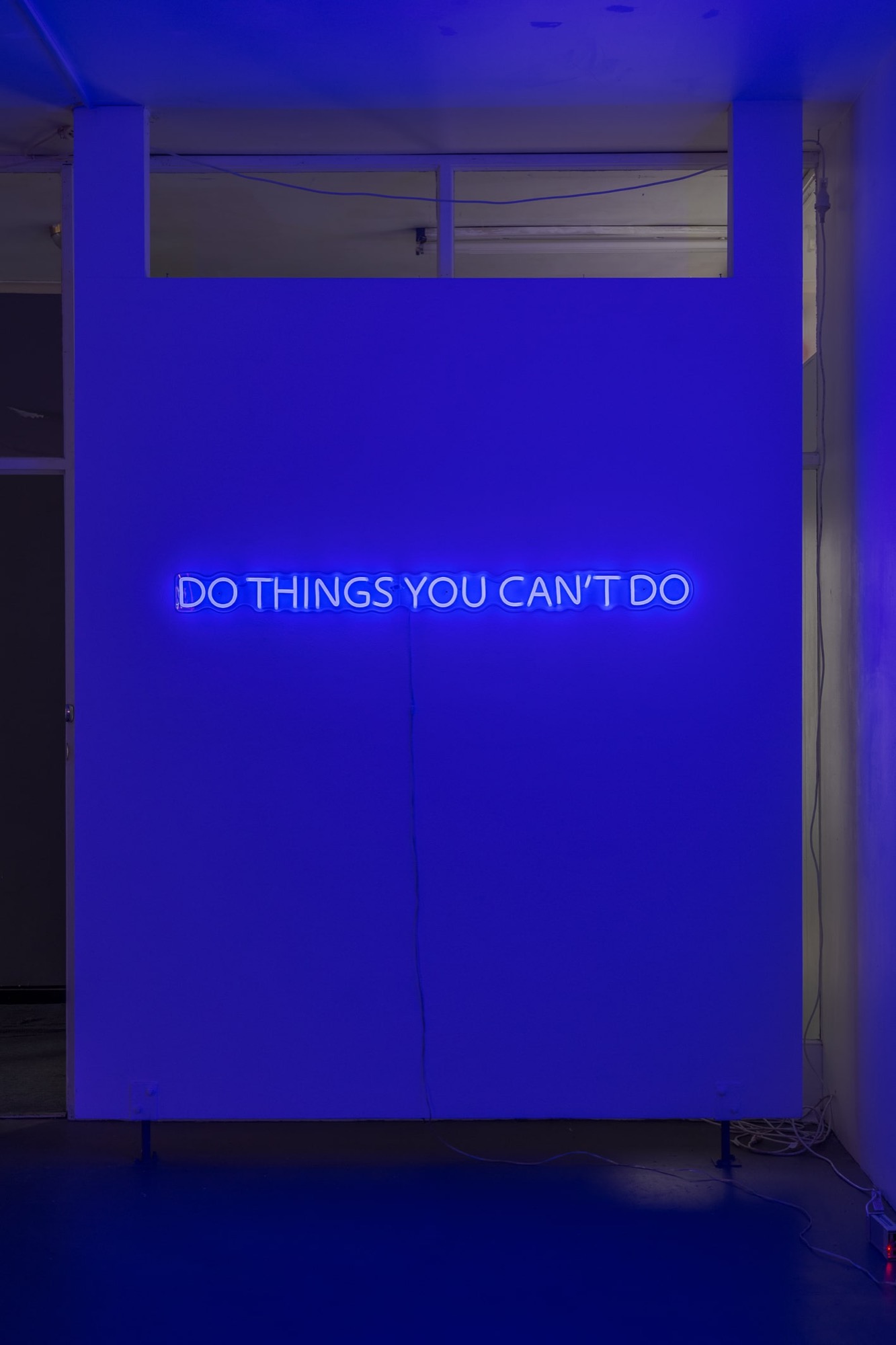 Chunxiao Qu, <em>DO THINGS YOU CAN’T DO</em>, 2019, led neon with transparent acrylic frames, 146.4 x 10 cm, edition of 5. Photo: Christo Crocker