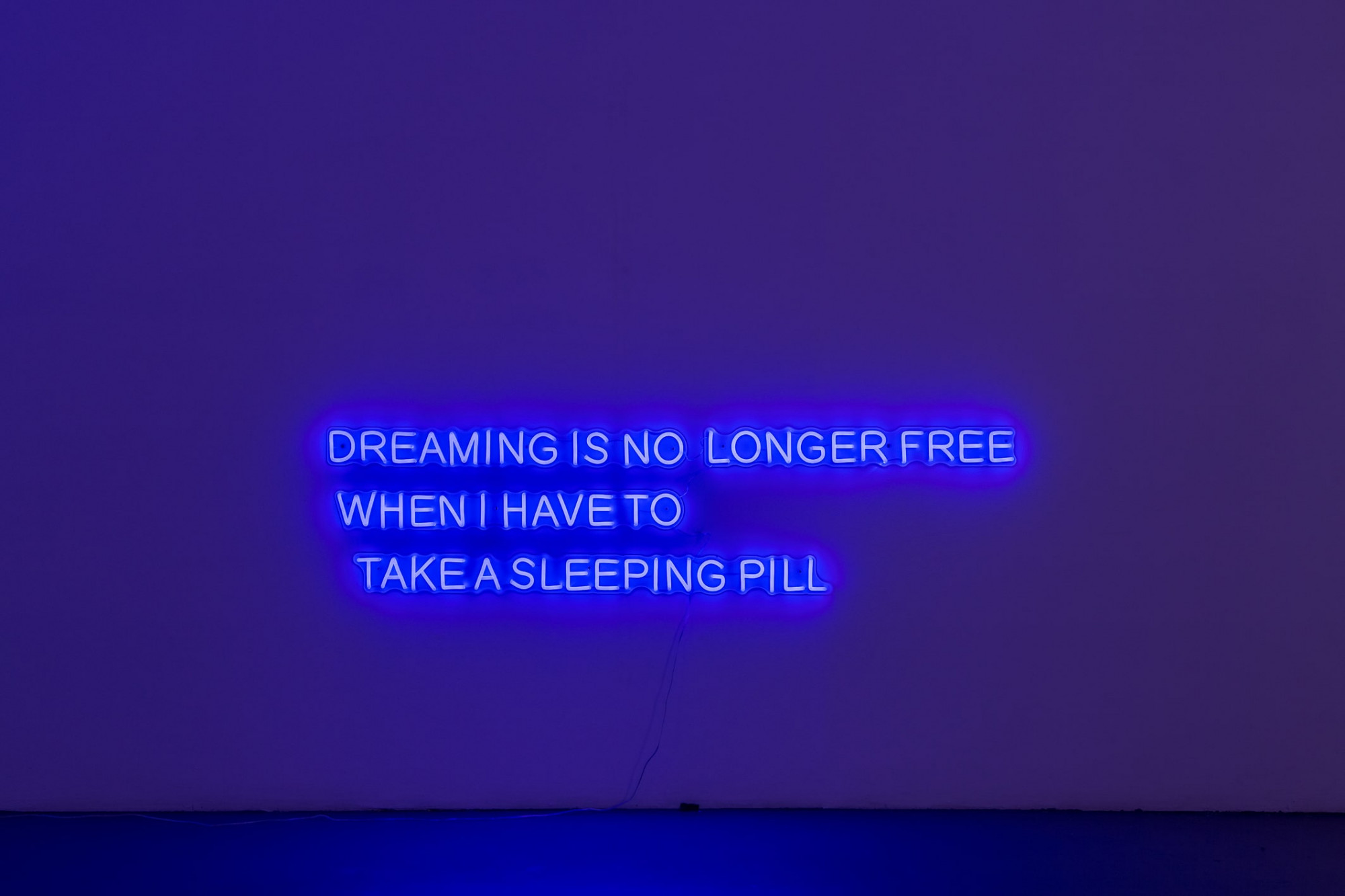 Chunxiao Qu, <em>DREAMING IS NO LONGER FREE WHEN I HAVE TO TAKE A SLEEPING PILL</em>, 2021, led neon with transparent acrylic frames, 176.74 x 30.7 cm, edition of 5. Photo: Christo Crocker