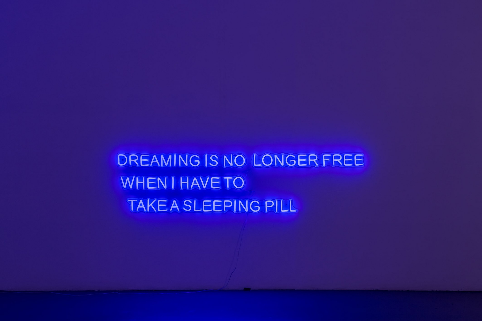 Chunxiao Qu, <em>DREAMING IS NO LONGER FREE WHEN I HAVE TO TAKE A SLEEPING PILL</em>, 2021, led neon with transparent acrylic frames, 176.74 x 30.7 cm, edition of 5. Photo: Christo Crocker