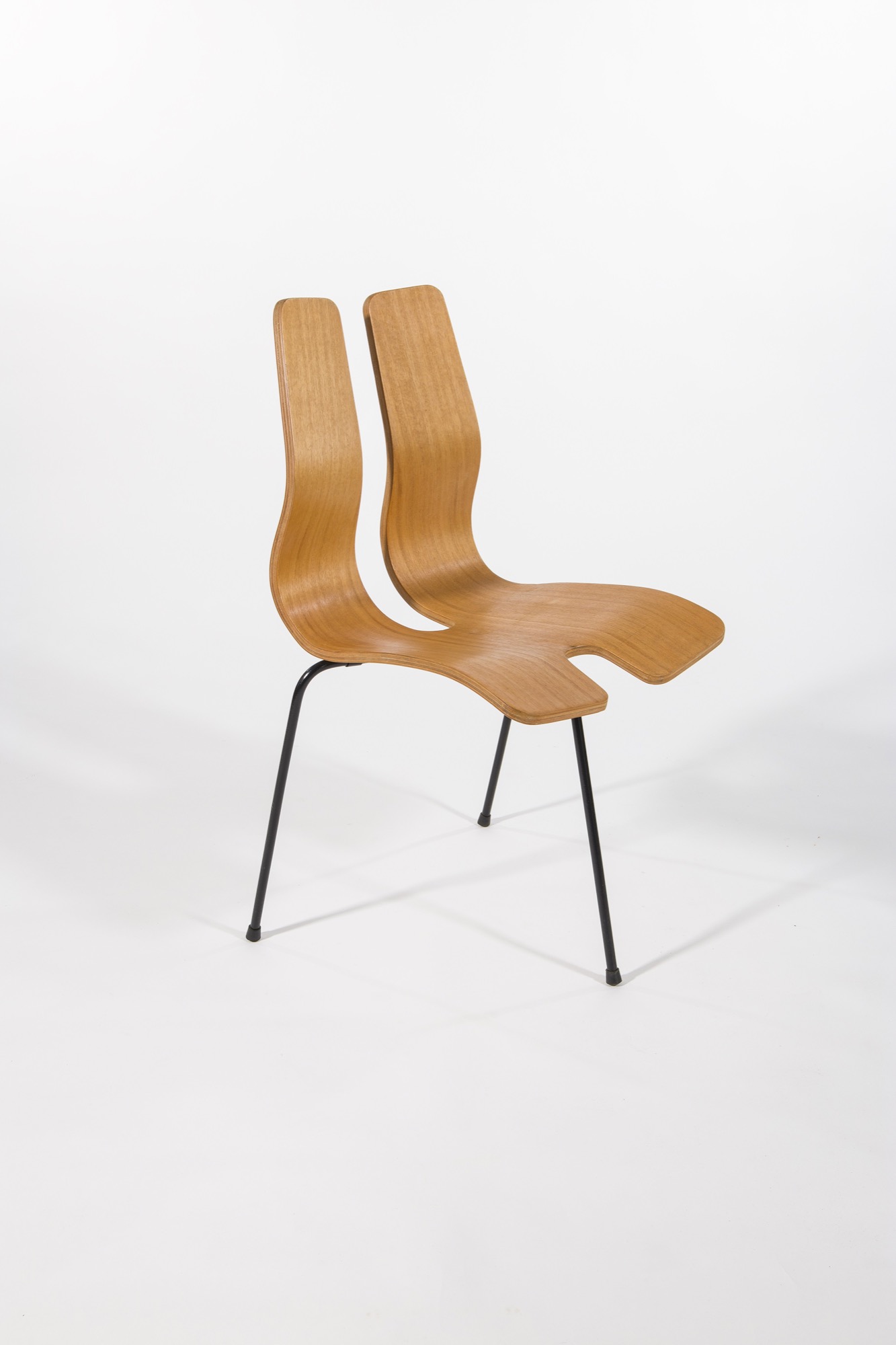 Clement Meadmore, <em>Three-legged plywood chair</em>, 1955, painted steel, plywood, rubber. Harris/Atkins Collection.