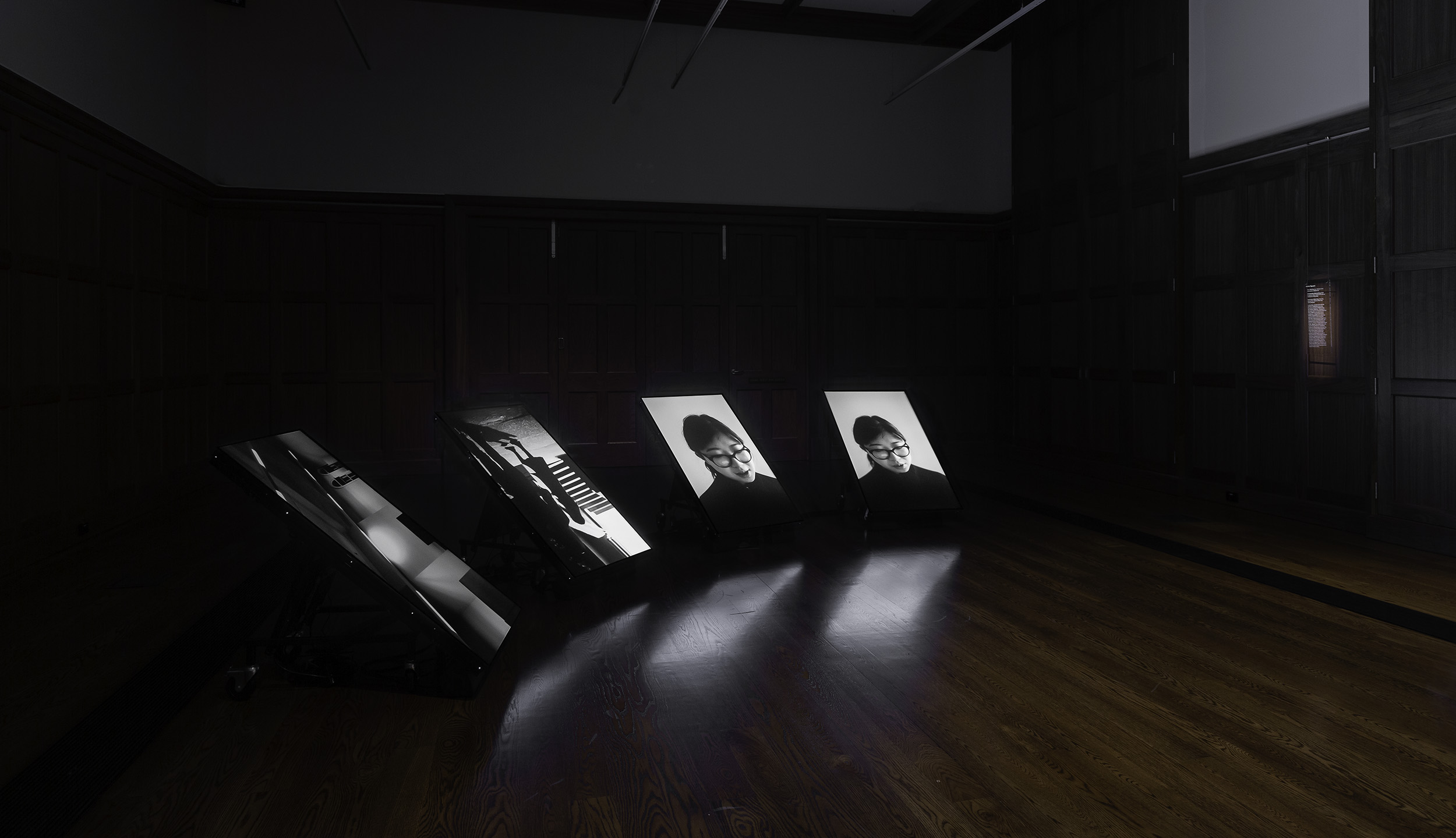 Installation view of James Nguyen, An Australian National Song 2022, 4-channel video, 8:55 min. On display in Collective Unease at the Ian Potter Museum of Art, Old Quadrangle, University of Melbourne. Photo: Christian Capurro. Courtesy of the curators.