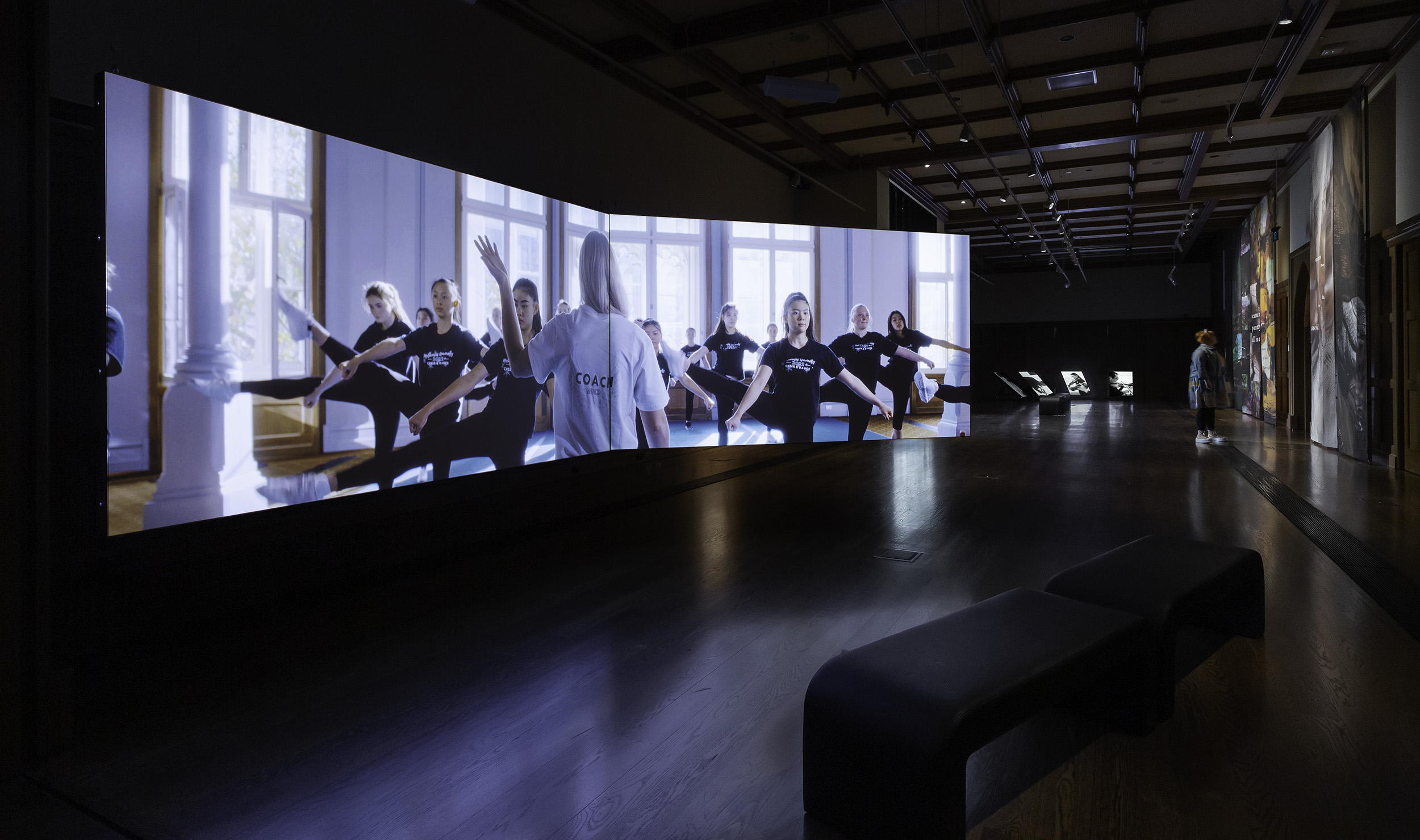 Instal shot of Andy Butler, The Agony and the Ecstasy 2022, 2-channel video, 8 min. On display in Collective Unease at the Ian Potter Museum of Art, Old Quadrangle, University of Melbourne. Photo: Christian Capurro. Courtesy of the curators.