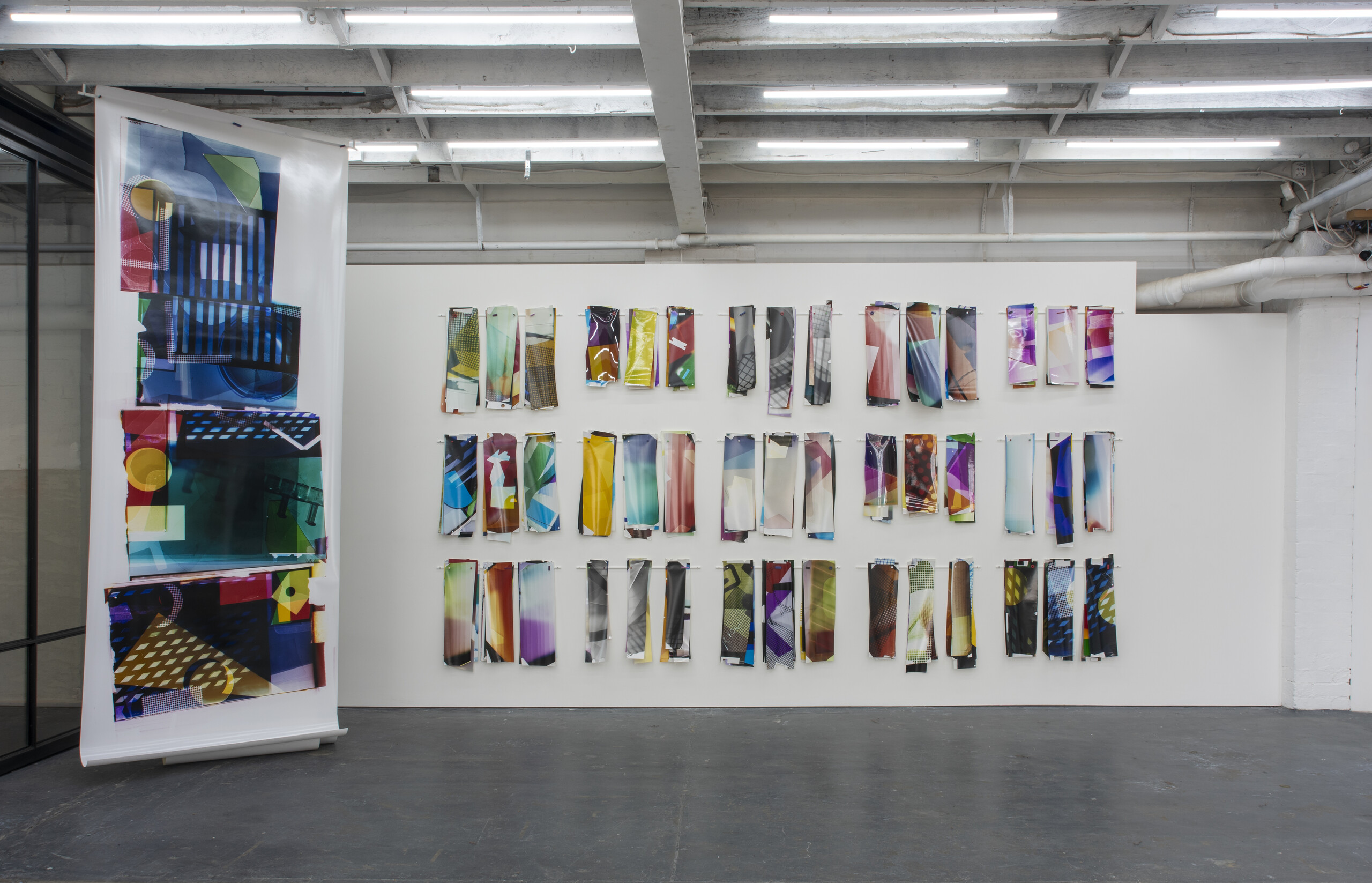 Installation view, <em>Far From the Eye (Fingertip Glance #4)</em>, 2020-21, and <em>Colour Bleeds and Light Folds (test strips 2013–2023)</em>, 2023. Courtesy Danica Chappell