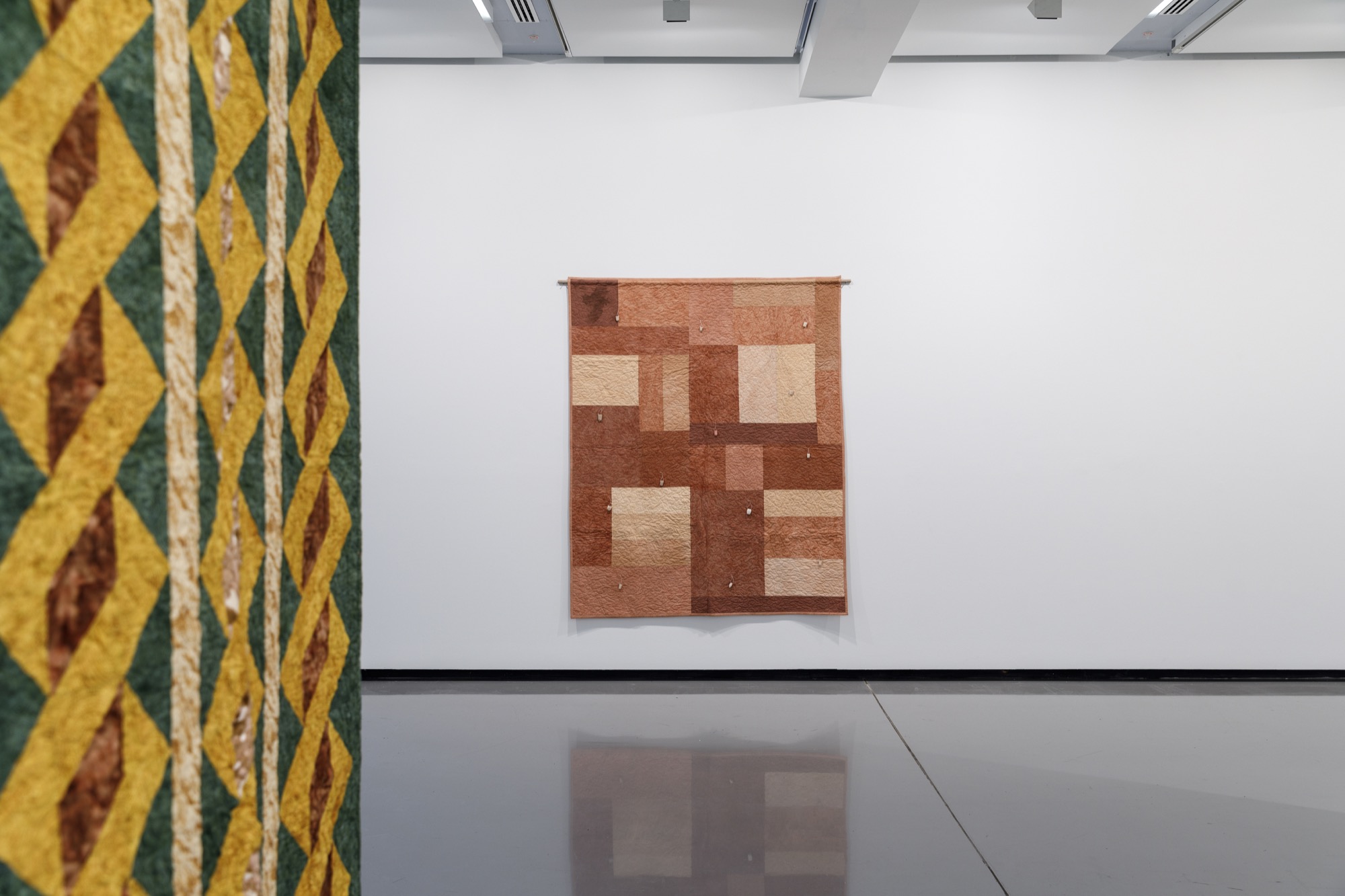 Kate Harding, <em>Cylinders 2020 (detail)</em> and <em>Carnarvon 2020</em>. Installation view, <em>Dale Harding: Through a lens of visitation</em>, Monash University Museum of Art, Melbourne, 2021. Photo: Andrew Curtis. Image courtesy of the artist and Milani Gallery, Brisbane.