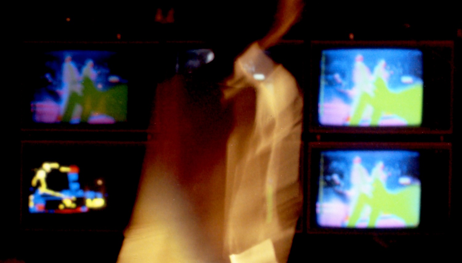 Computers and Electronics in the Arts, Lakeside International Hotel, Canberra, 1975. Collection of Stephen Jones. One of Philippa Cullen’s dancers with monitors showing John Hansen’s video synthesiser images of their movements. Photo: Peter West