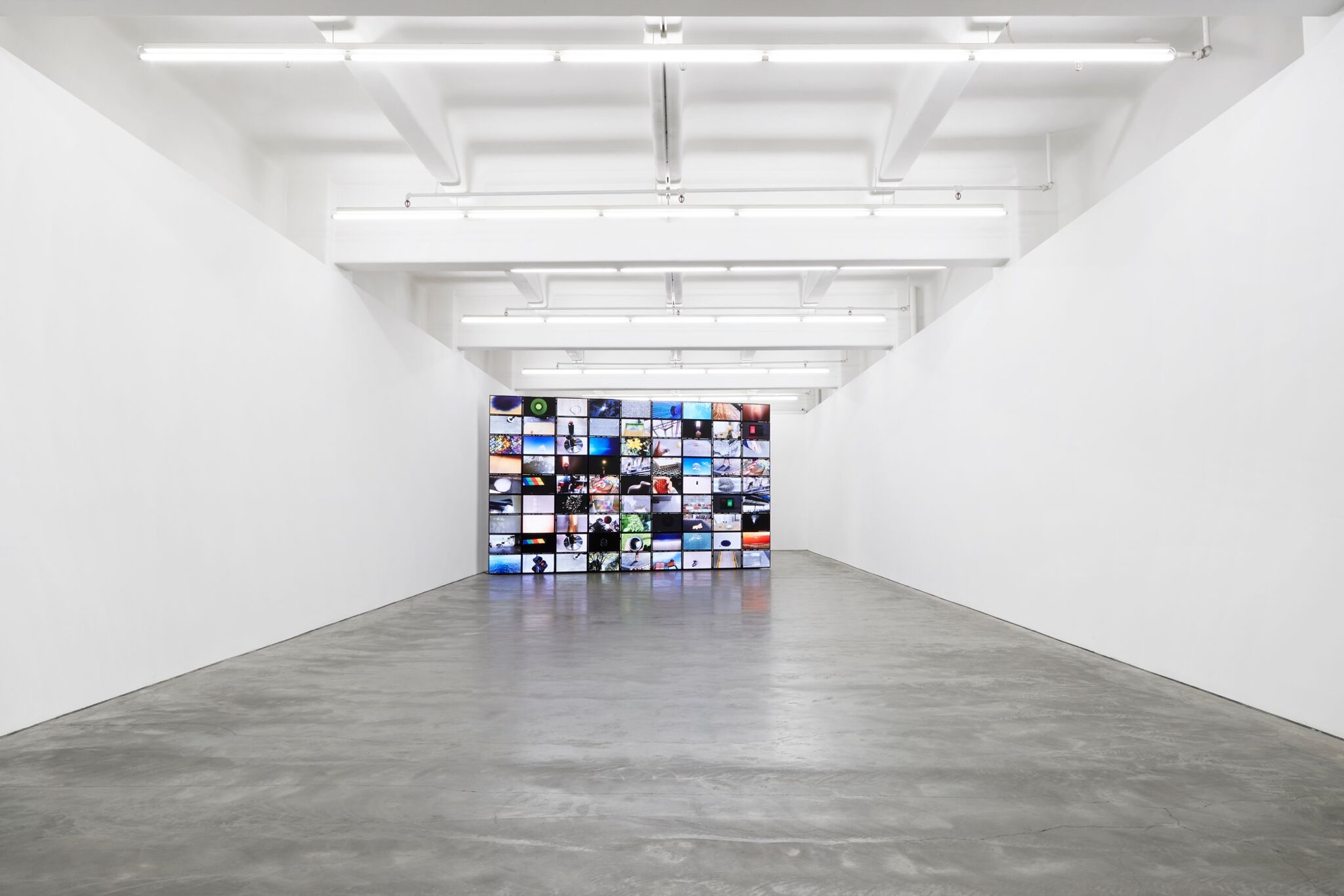 DANIEL VON STURMER, <em>CATARACT</em>, 2019,81 screen installation, 300 x 510 x 40 cm. Image courtesy the artist and Anna Schwartz Gallery. Photograph: Zan Wimberley.