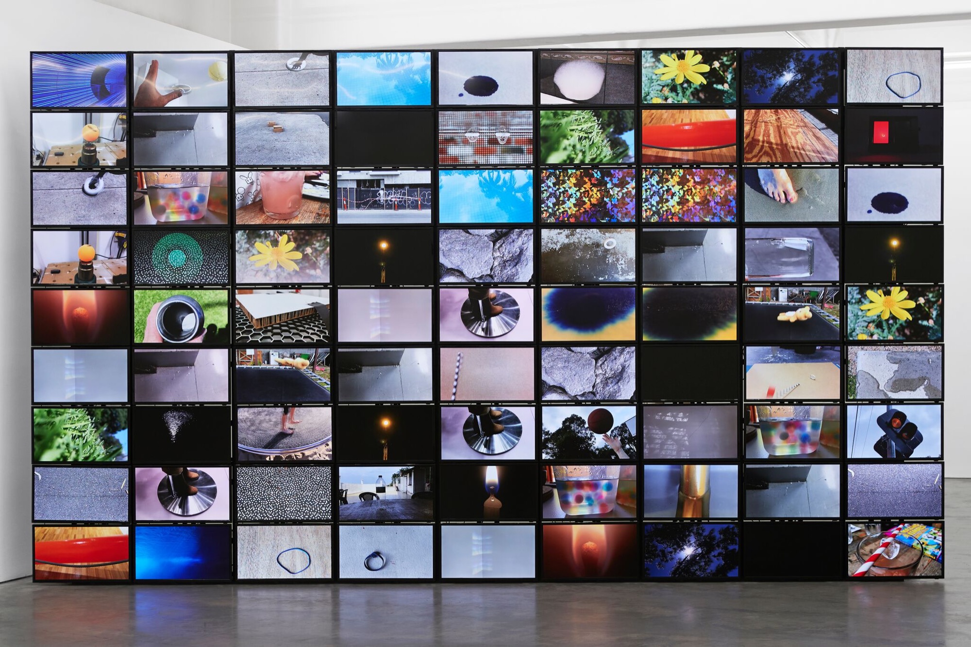 DANIEL VON STURMER, <em>CATARACT</em>, 2019, 81 screen installation, 300 x 510 x 40 cm. Image courtesy the artist and Anna Schwartz Gallery. Photograph: Zan Wimberley.