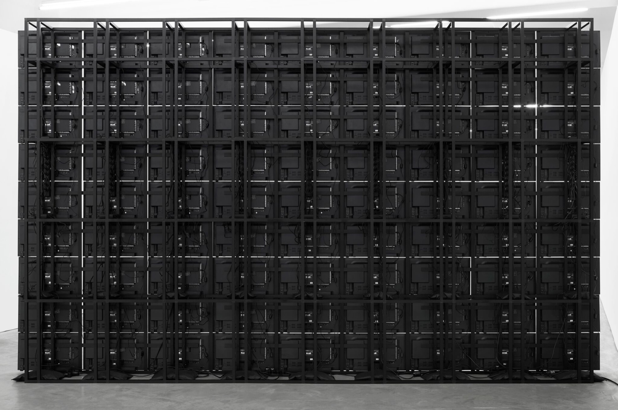 DANIEL VON STURMER, <em>CATARACT</em>, 2019, 81 screen installation, 300 x 510 x 40 cm. Image courtesy the artist and Anna Schwartz Gallery. Photograph: Zan Wimberley.