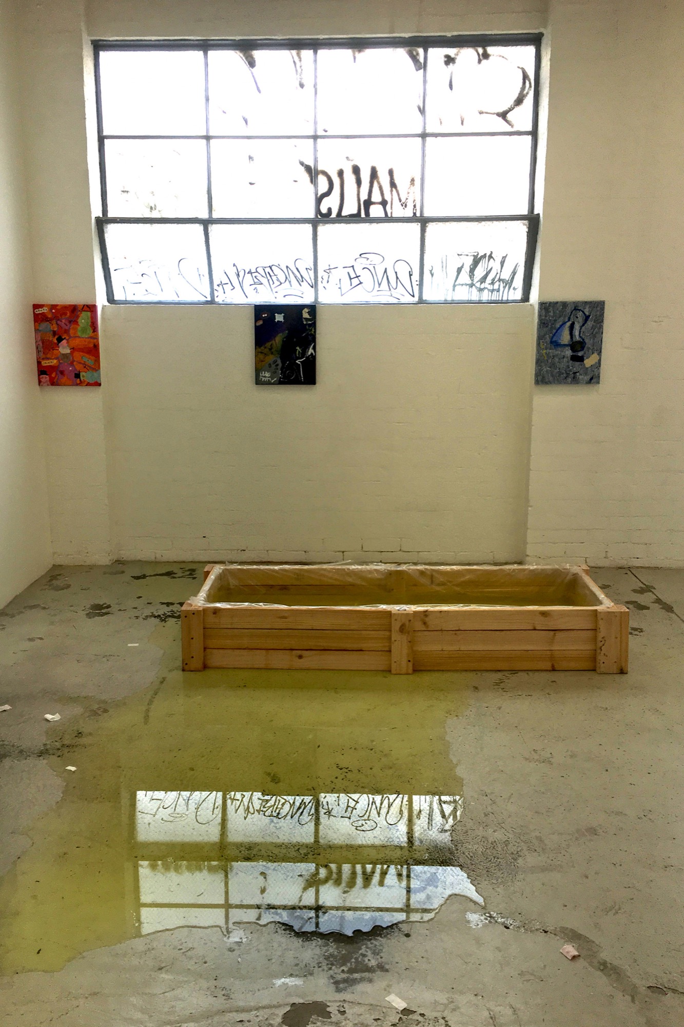 Jemi Gale with fabrication by Alexandra Nemarič, <em>untitled (drowning curse pool)</em>, 2021, wood, screws, plastic, staples, spray paint, band-aids, water, mountain dew, 199 x 73 x 28 cm, TCB Art Inc. Photo: Audrey Schmidt
