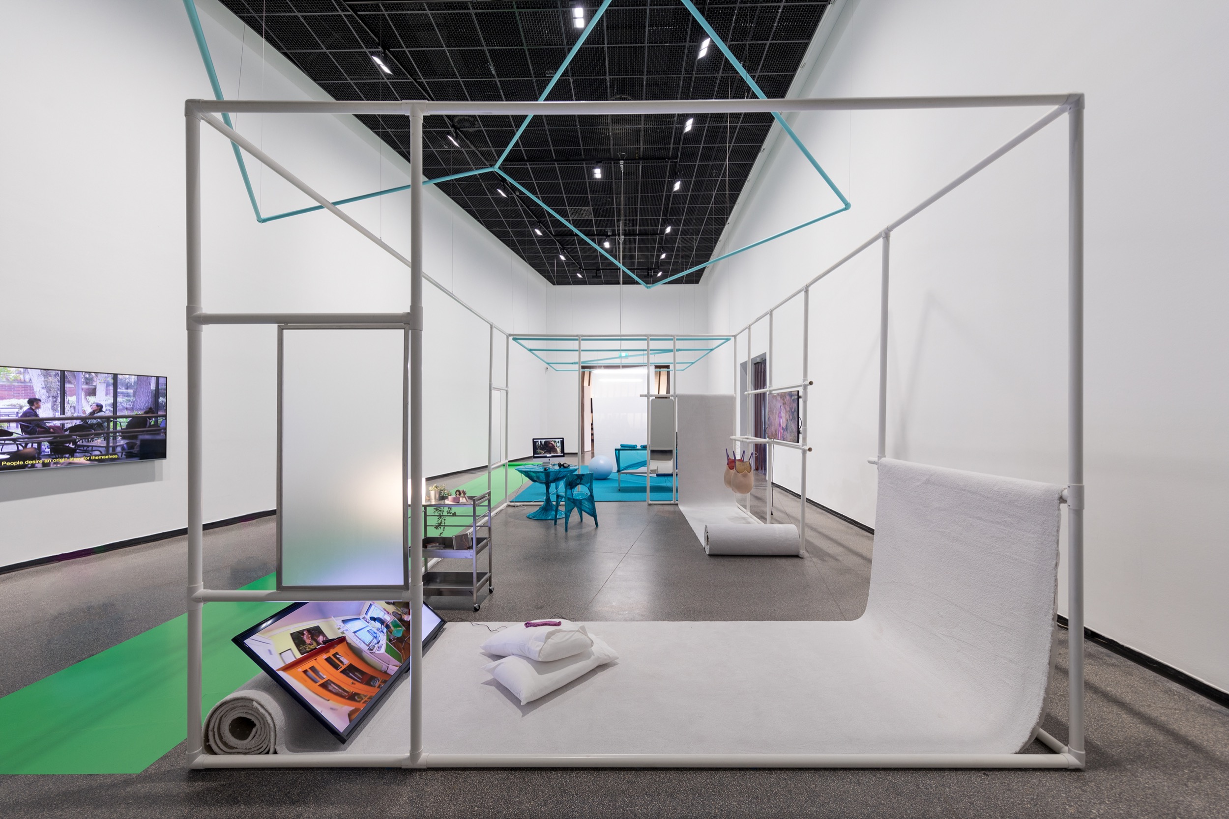 Lauren Lee McCarthy, <em>Surrogate</em> 2022 and <em>LAUREN</em> 2017–ongoing, installation view, Australian Centre for Contemporary Art, Melbourne. Courtesy the artist. Photograph: Andrew Curtis