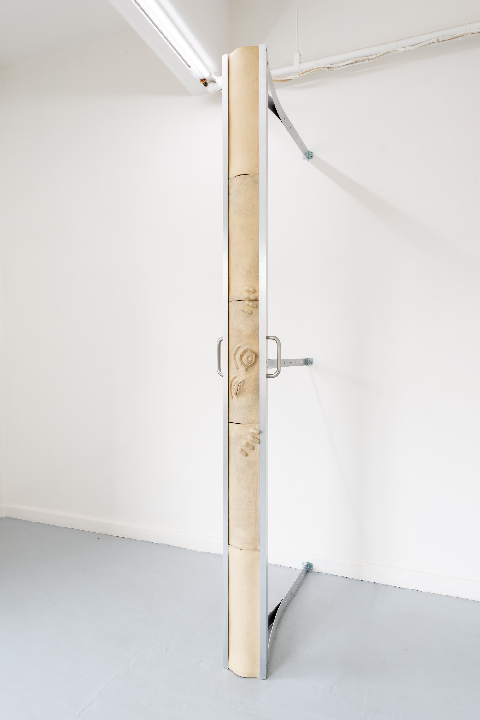 <p>Katie Ryan, <em>The Door Problem</em>, 2024, aluminium, stoneware, wood, MDF, chrome paint, fixings, 240 x 99 x 25cm. Courtesy of the artist and CAVES. Photo: Sebastian Kainey</p>