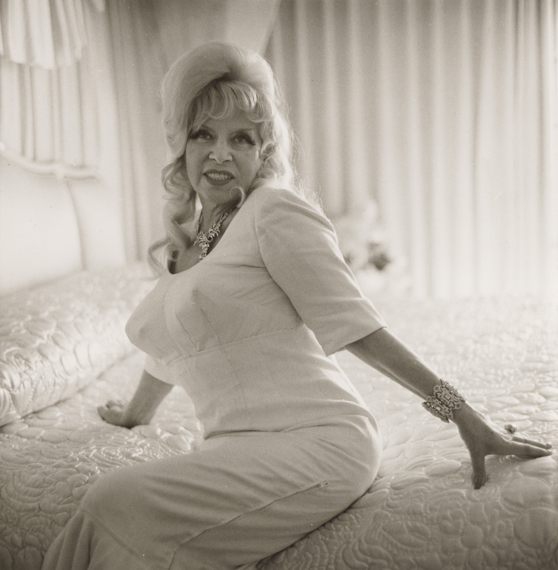 Diane Arbus, <em>Mae West on bed,</em> 1965, gelatin silver photograph, National Gallery of Australia, Canberra, Purchased 1981.