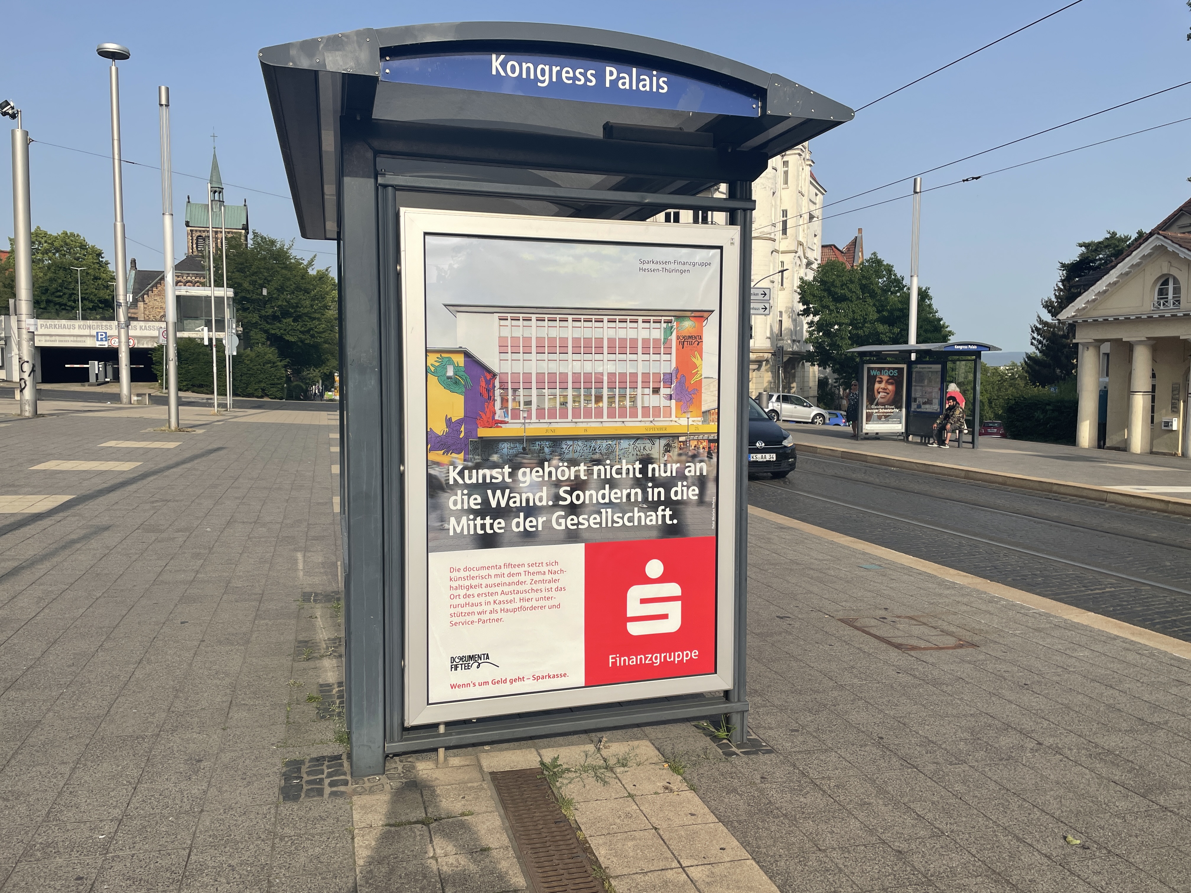 documenta fifteen advertisement at Kongress Palais tram stop, Kassel.