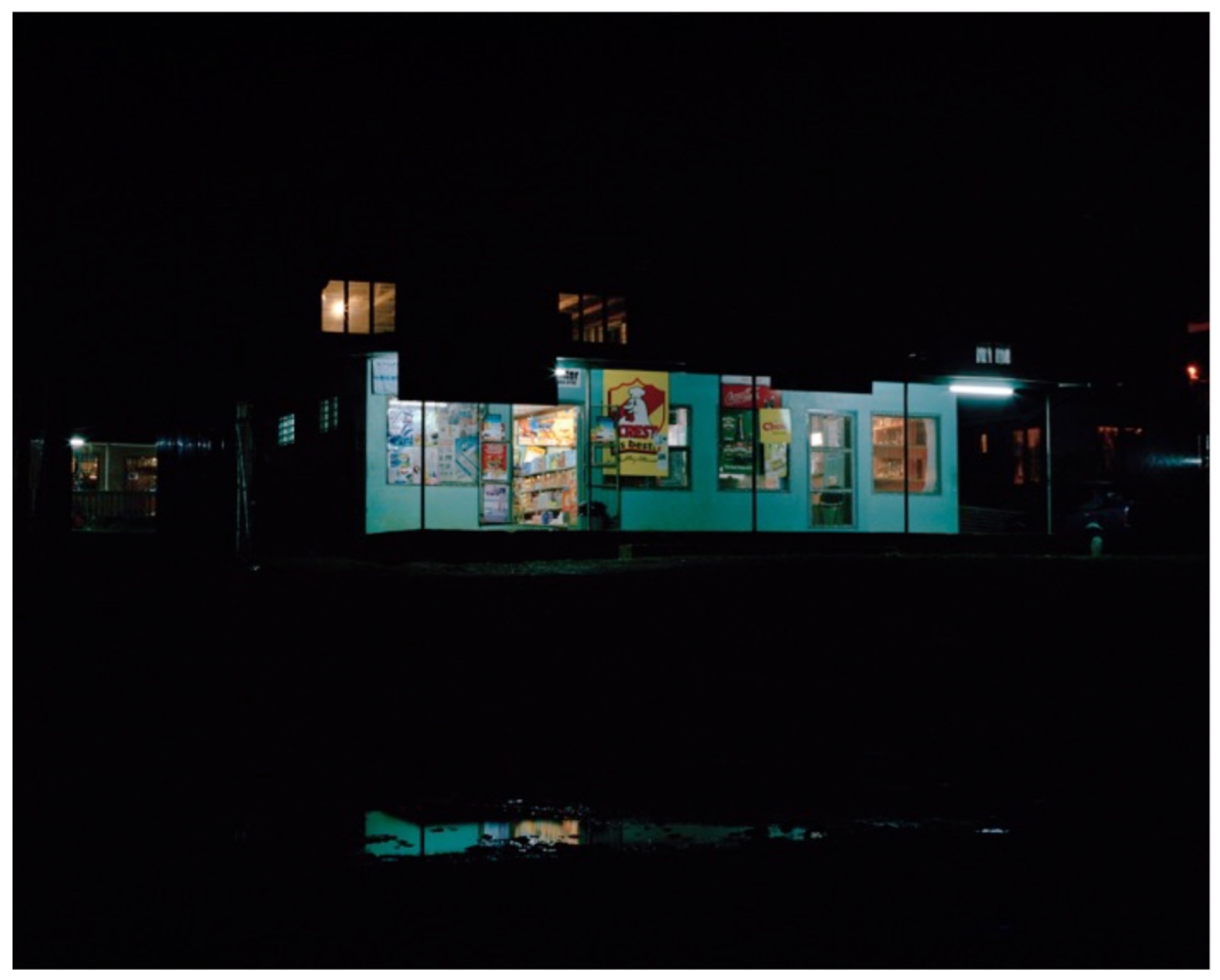 Douglas Lance Gibson, <em>Sitoa Na Dola Ni Bogi (Store Open At Night)</em>, 2014.<br />
Archival pigment print, coconut timber frame, 40 x 50 cm.