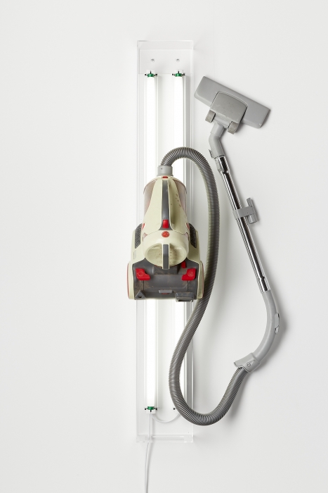 David Attwood, <em>Post New Hoover Core</em>, 2020, Hoover Core Vacuum Cleaner, fluorescent lights, acrylic, 142 x 55 x 43 cm. Photo: Christo Crocker