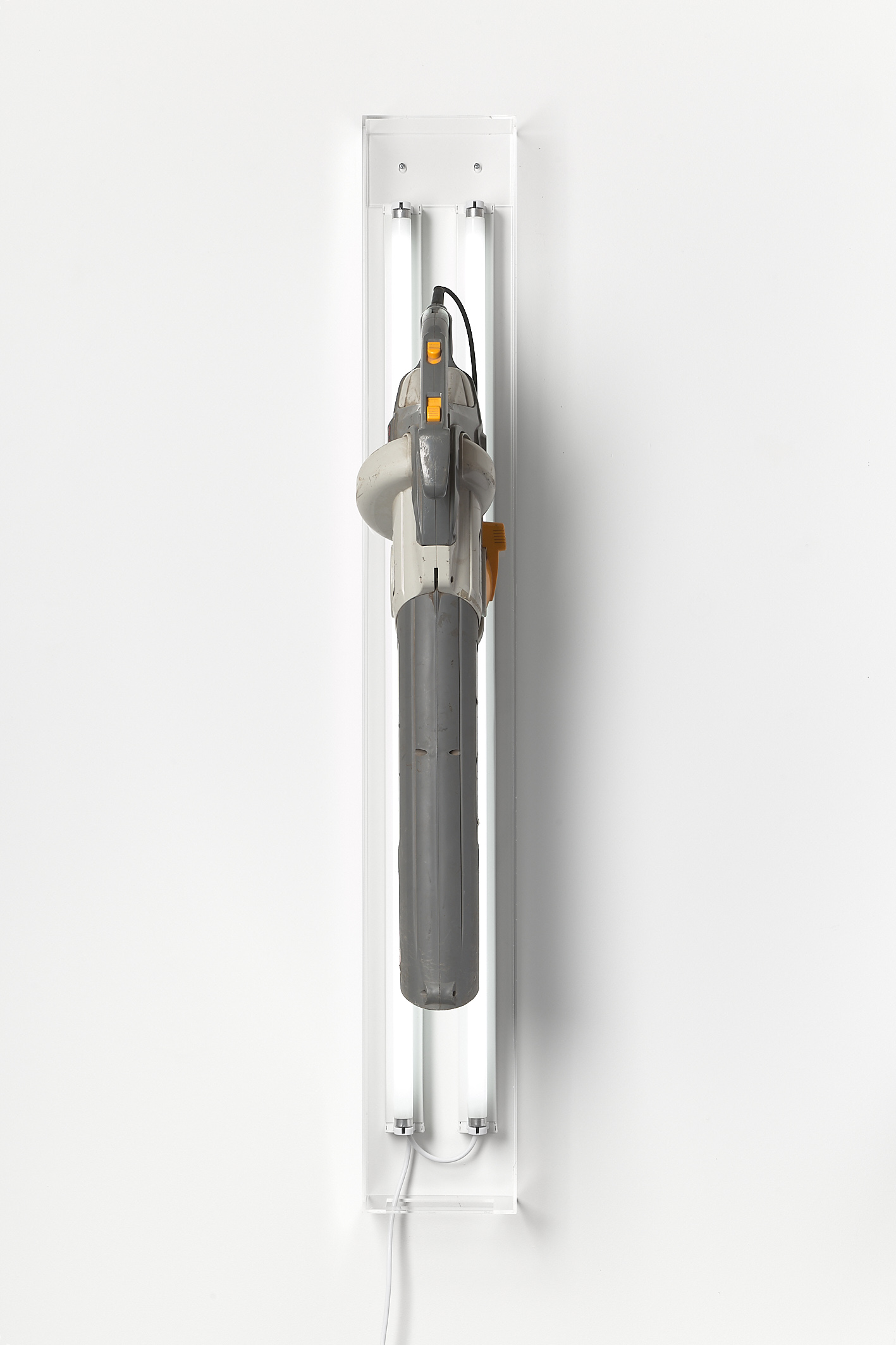David Attwood, <em>Post New Ryobi RESV2200T</em>, 2022, Ryobi RESV2200T Electric Leaf Blower Vacuum, fluorescent lights, acrylic, 142 x 20 x 40 cm. Photo: Christo Crocker