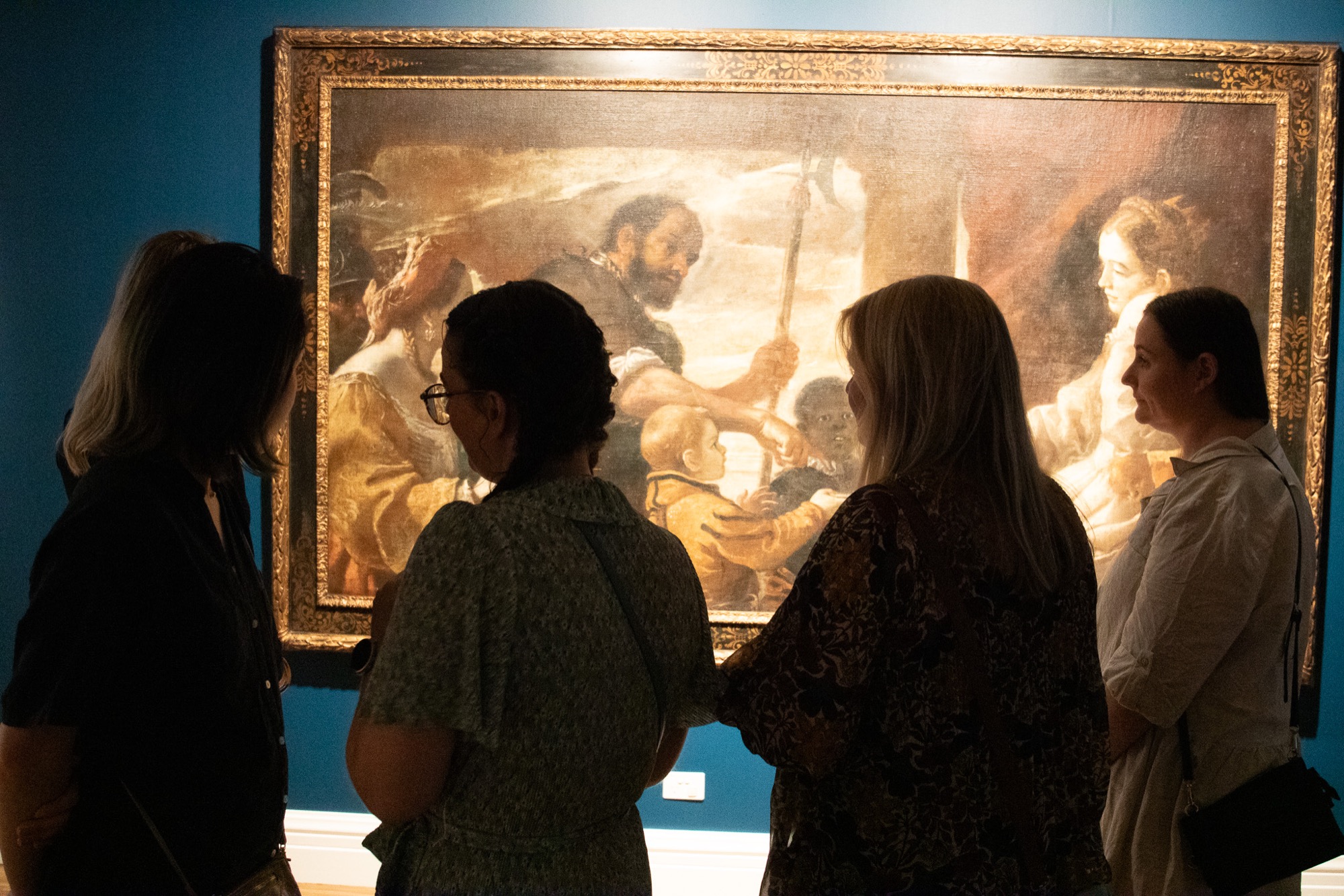 Gallery visitors looking at Mattia Preti, <em>Sophonisba receiving the Poison,</em> 1675. Oil on canvas. National Gallery of Victoria. Felton Bequest, 1968. Courtesy of Hamilton Gallery.