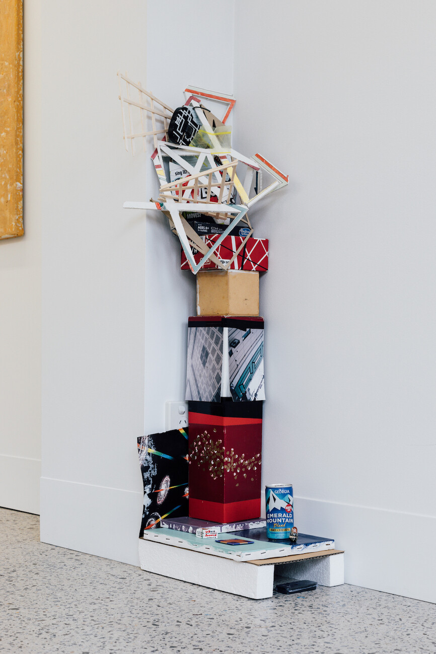 <p>Masato Takasaka, <em>Yet Another Propositional Model for the EVERYTHING ALWAYS ALREADY-MADE STUDIO MASATOTECTURES MUSEUM OF FOUND REFRACTIONS (1999-2024) Yes, You Kant After Duchamp!, </em>2024, mixed media, enamel and acrylic on canvas, cardboard, foam-core, found objects, self-adhesive vinyl on found packaging, 92 x 35 x 22 cm, photograph: Lauren Dunn. </p>