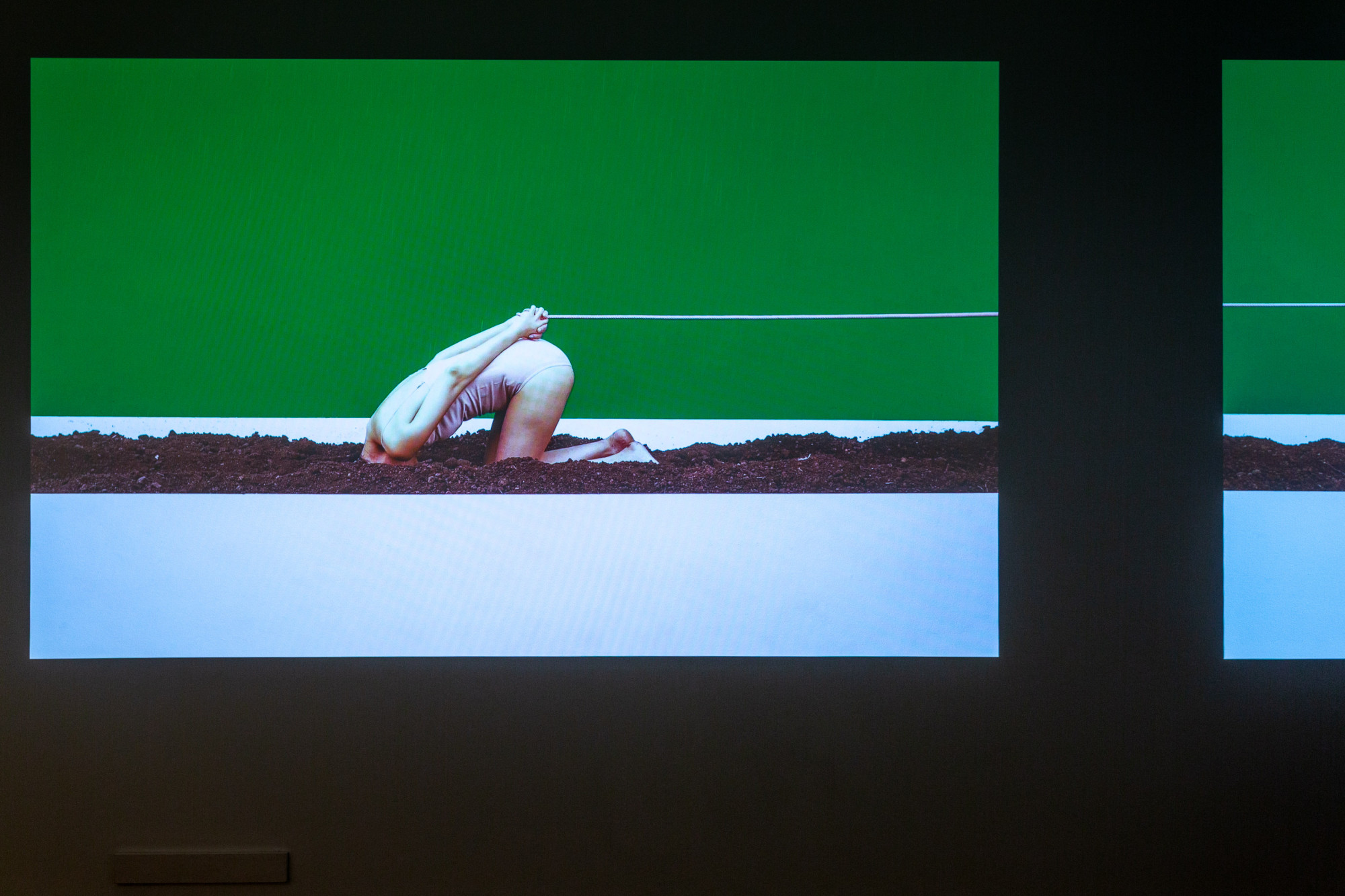 Detail of Kawita Vatanajyankur, <em>The Plough</em>, 2020, 2-channel HD video, Centre for Contemporary Photography. Image courtesy of CCP. Photo: J Forsyth.