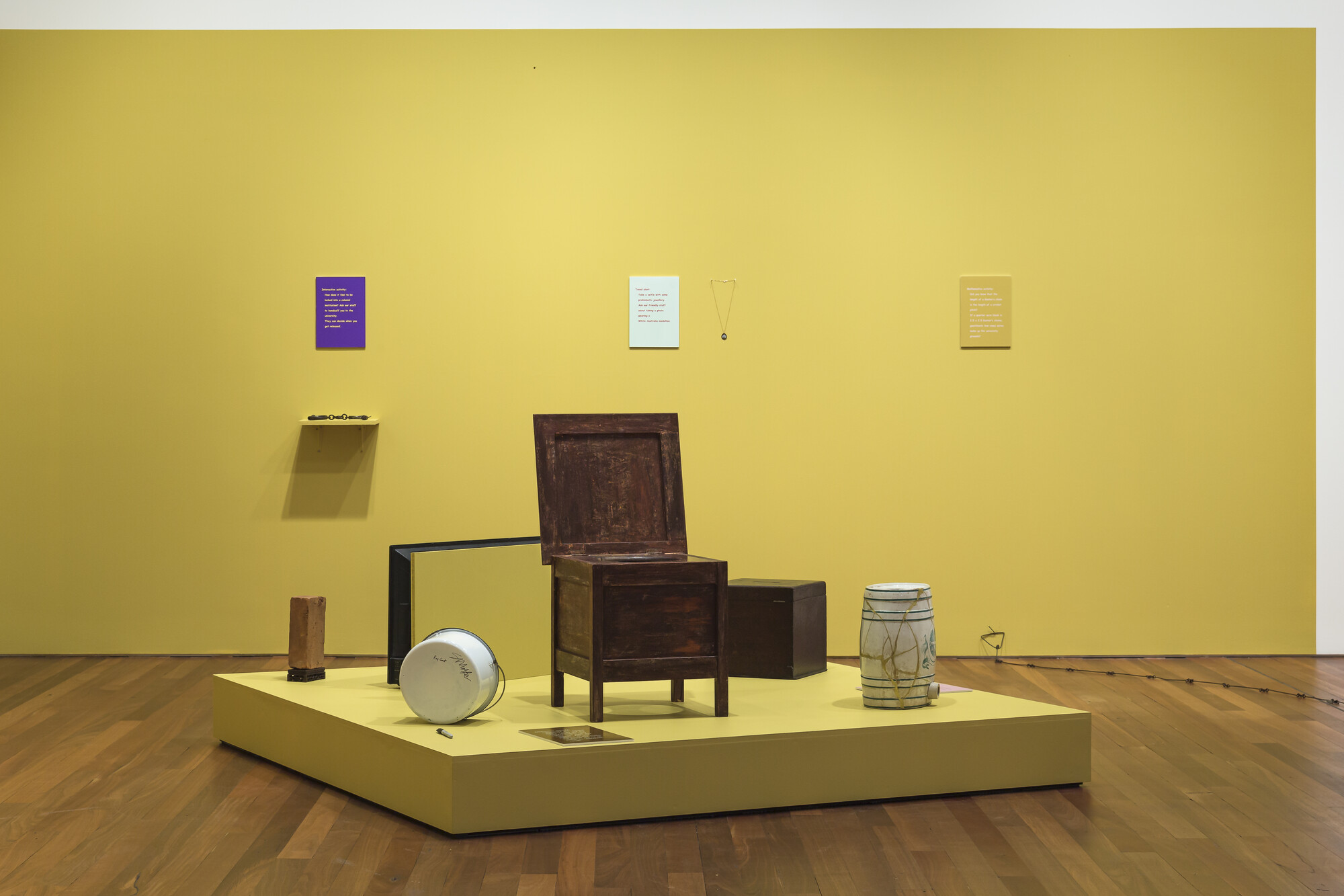 Install view: A park is not a forest, curated by Salote Tawale, Sydney College of the Arts. Foreground: Salote Tawale, <em>With love, from here</em>, 2021. Mixed media, Single Channel HD Video (3:00). Background: Tiyan Baker, <em>Head Party</em>, 2022. Mixed media; and Sione Tuívailala Monū, <em>sione_has_doubts</em>, 2022. Four-Channel HD Video. Courtesy the artists. Photo: Document Photography