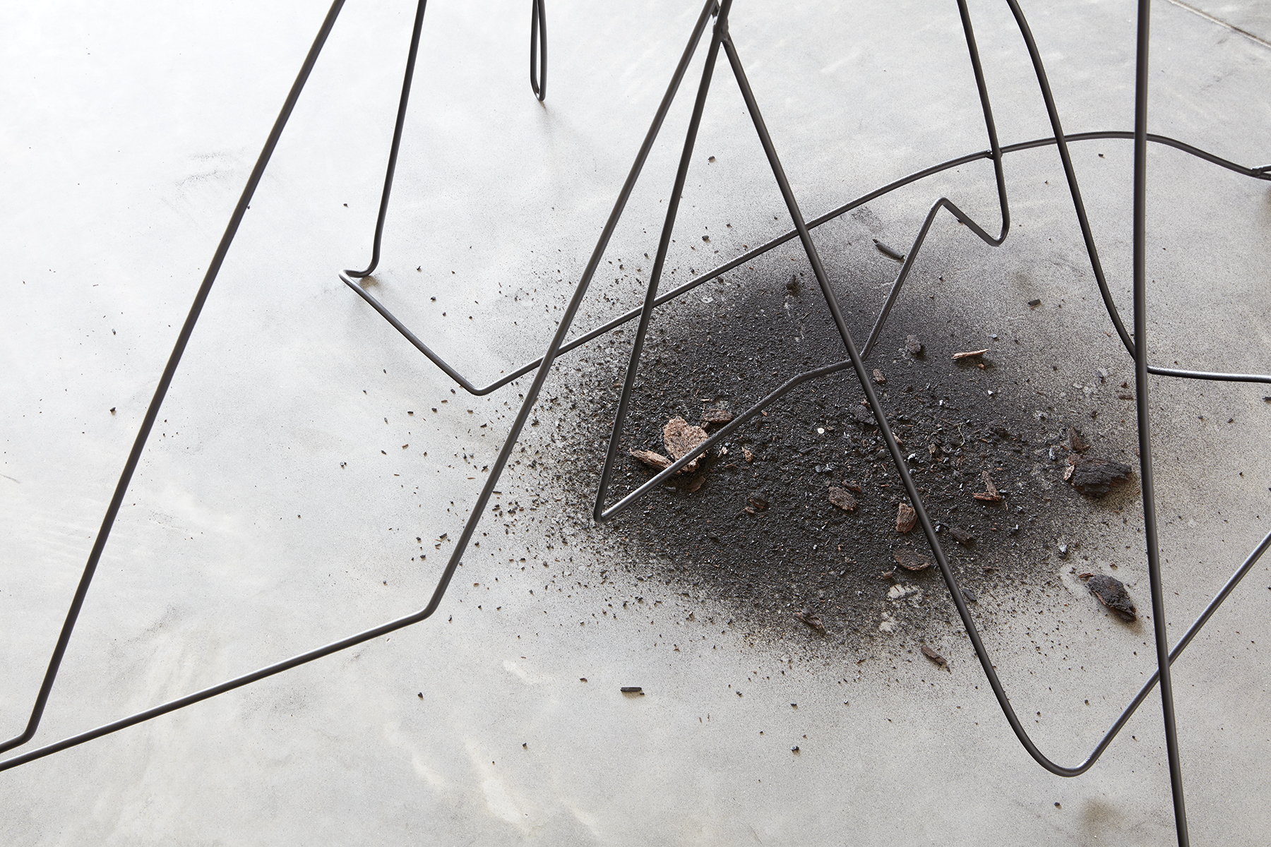Emily Parsons-Lord, <em>Every essence of your beloved one is captured forever </em>(installation view), 2021, single-channel video with stereo sound, steel, charcoal sourced from Bundanon, manufactured diamonds. Photo: Zan Wimberley