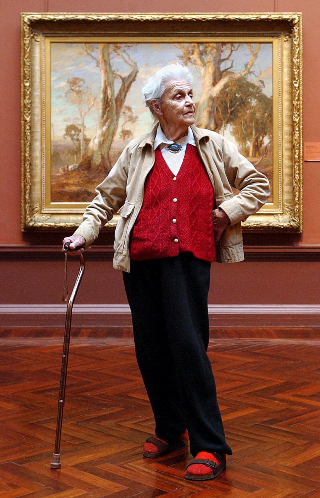 Nora Heysen at 92, pictured in front of Hans Heysen's <em>Red Gold</em>, Art Gallery of South, Australia, 2003, Photo: Brenton Edwards © News Ltd.