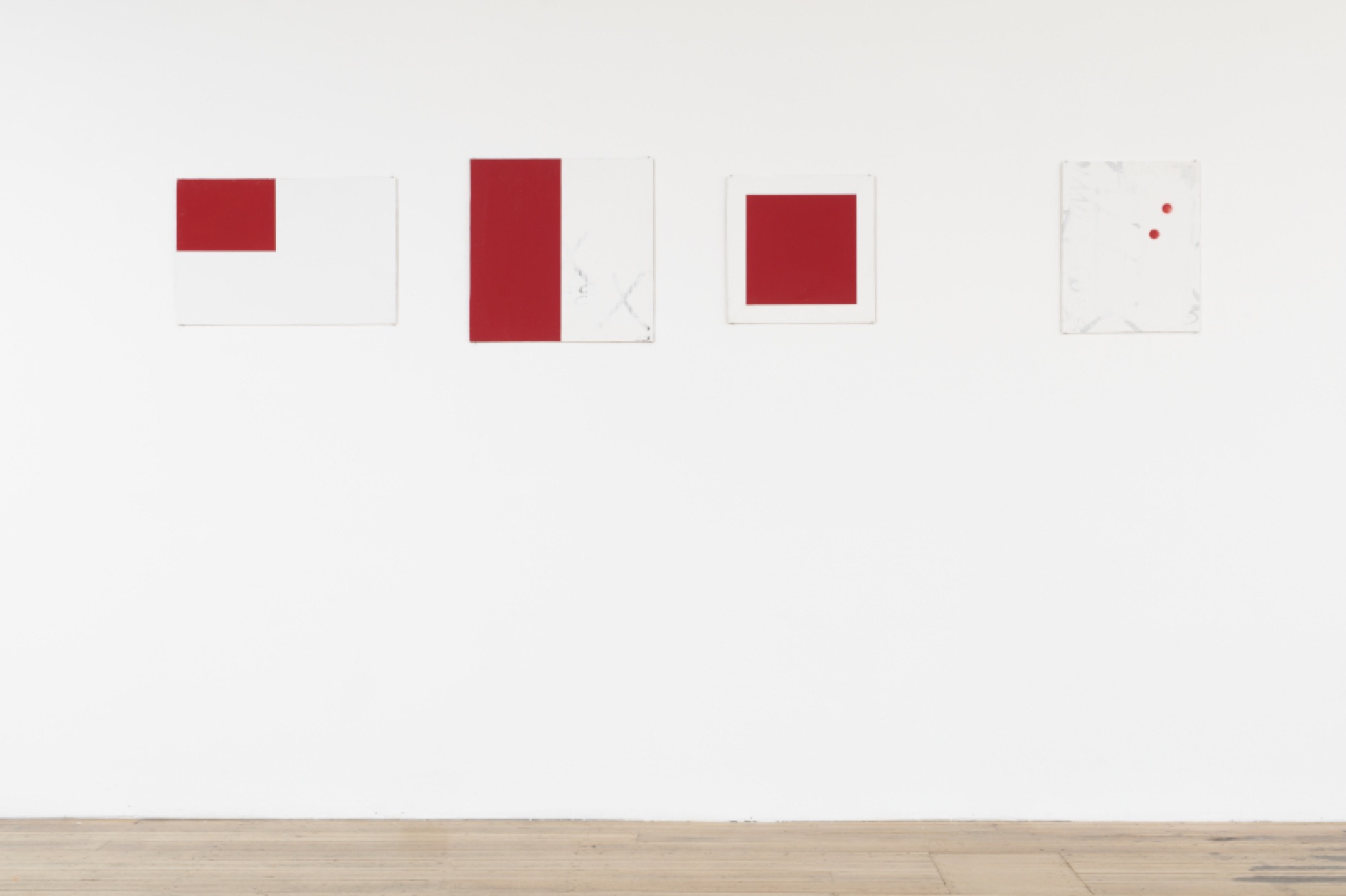 <p>Scott Redford (installation view, left to right), <em>Untitled (Blank flag/The red acrylic mixed with AZT)</em> 1998, enamel, acrylic and AZT on board; <em>Untitled (the red acrylic paint mixed with AZT)</em> 1998, enamel, acrylic and AZT on board; <em>Untitled (Red square/ the red acrylic mixed with AZT)</em> 1998, enamel, acrylic and AZT on board; <em>Above the elbow on the guy’s arm at the Wickham 3rd version</em>, 1997, enamel and acrylic on board. Photograph: Matthew Stanton.</p><p></p>