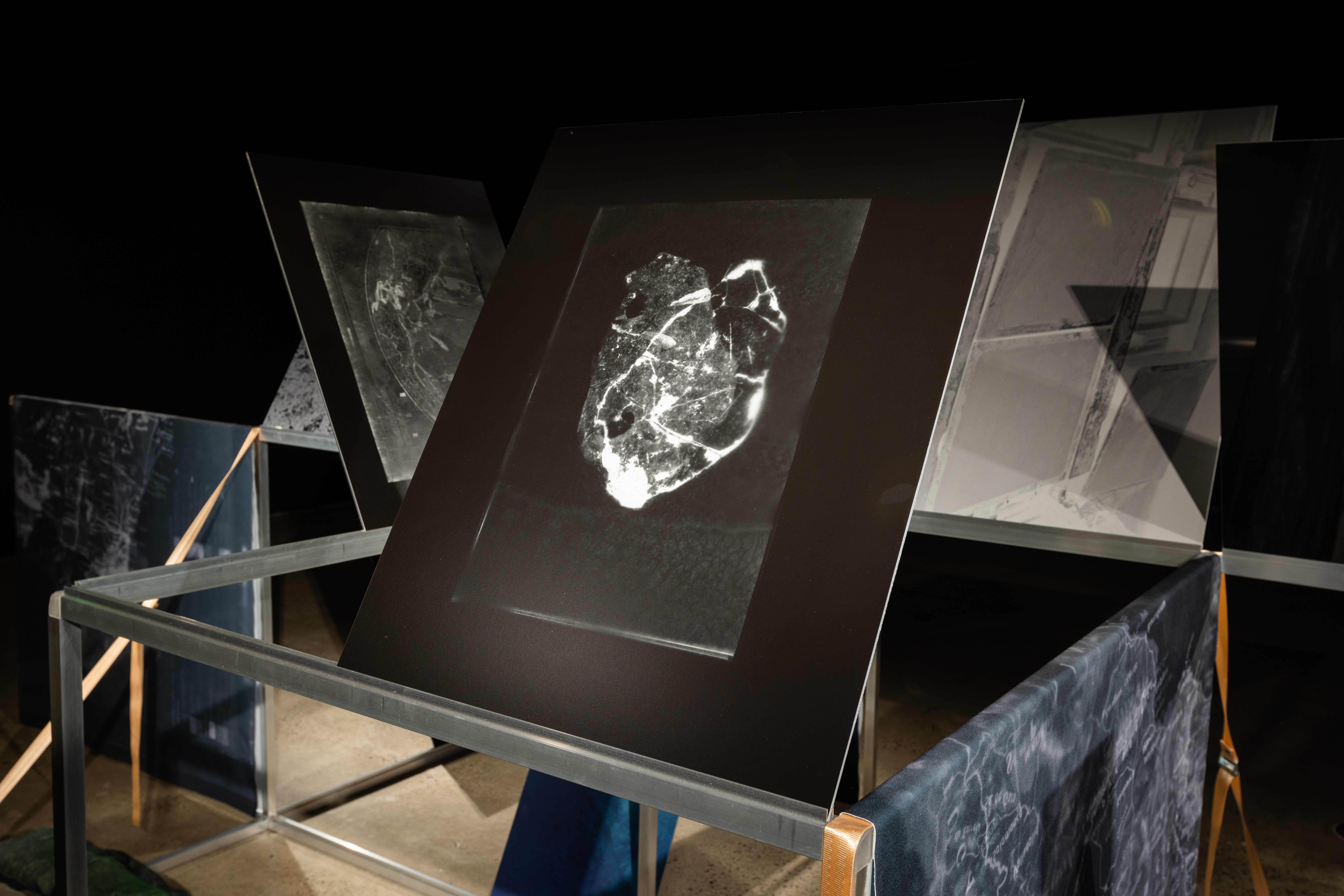 Installation view. Izabela Pluta, Variable Depth, Shallow Water (2020), silver gelatin photographs, pigment prints on aluminium, dye-sublimation prints, polyester waddling straps, two-way acrylic, aluminium, polyester resin, UNSW Galleries, Sydney, 2022. Image courtesy the artist, UNSW Galleries and Gallery Sally-Dan Cuthbert. Photo: Daniel Boud.