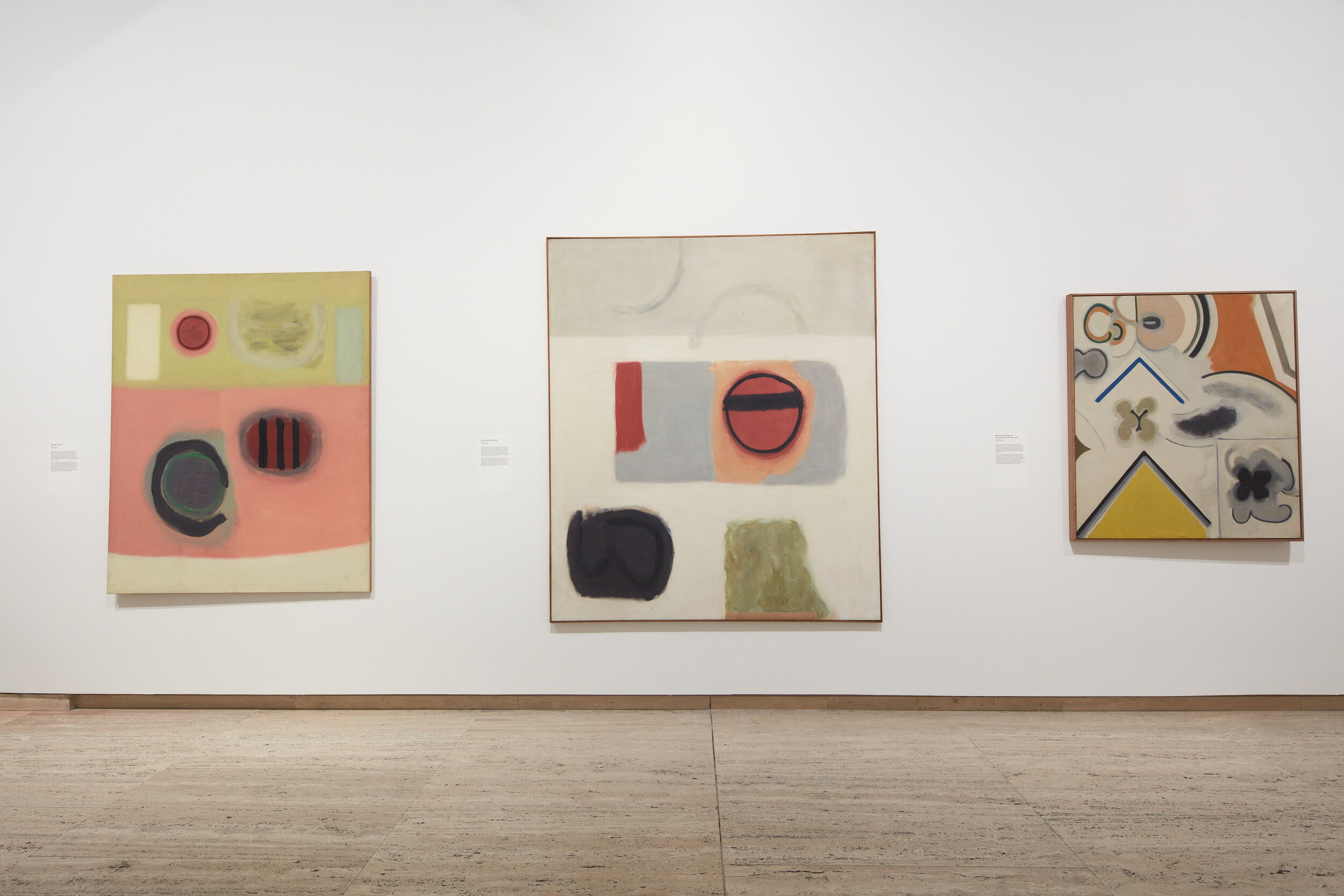 <p>Installation view of <em>Janet Dawson: Far Away, So Close </em>at the Art Gallery of New South Wales, featuring <em>Viponds Tune </em>(1961), <em>Circle and Black Bar </em>(1961) and <em>Mannerist Painting with Various Devices </em>(1964, reworked 1973), 19 July 2025 – 18 January 2026. Artworks © Janet Dawson, photo: Art Gallery of New South Wales, Jenni Carter.</p>