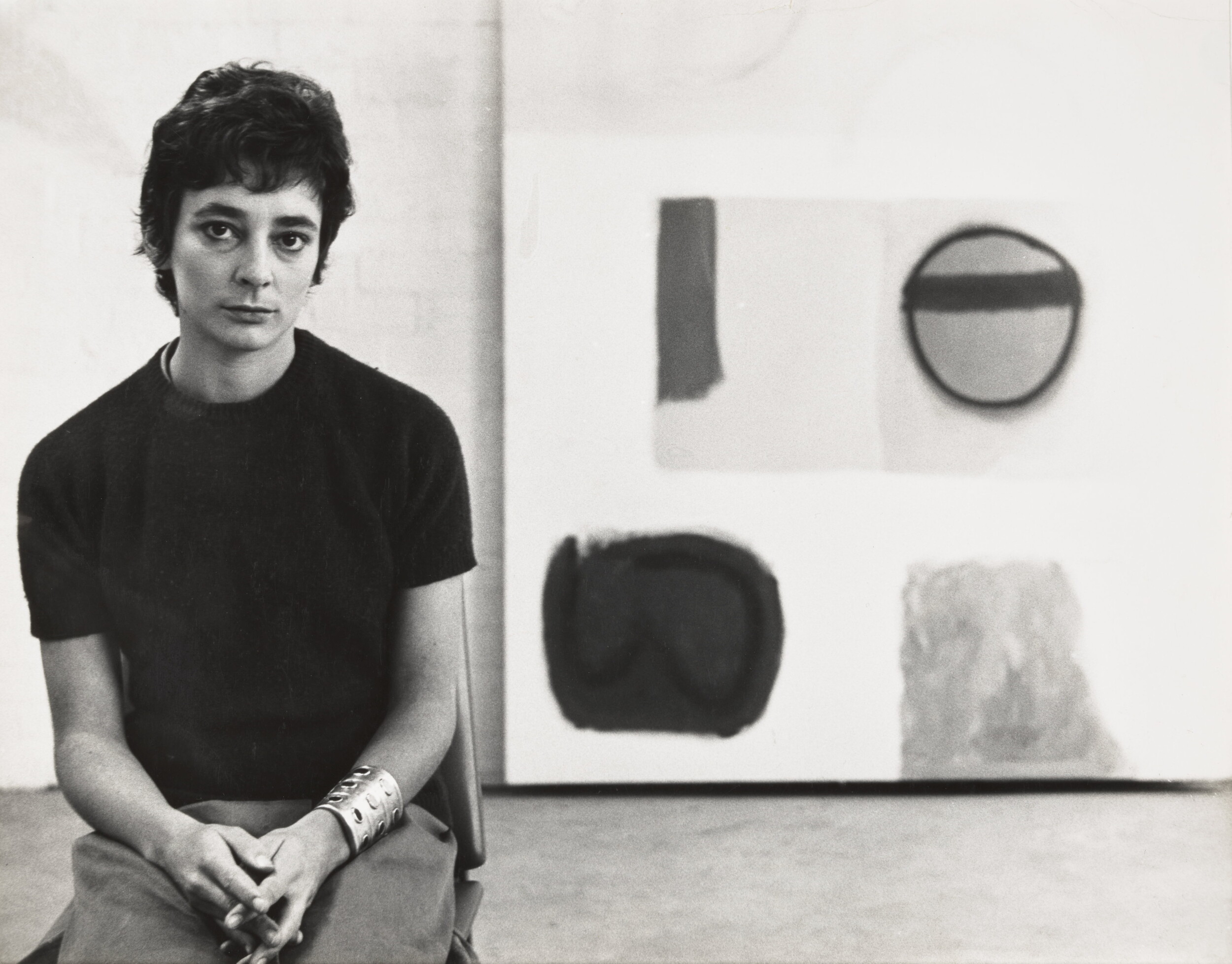 <p>Janet Dawson with <em>Circle and Black Bar</em> (detail), 1961, Melbourne, 1961. Courtesy of Janet Dawson, photographer unknown.</p>