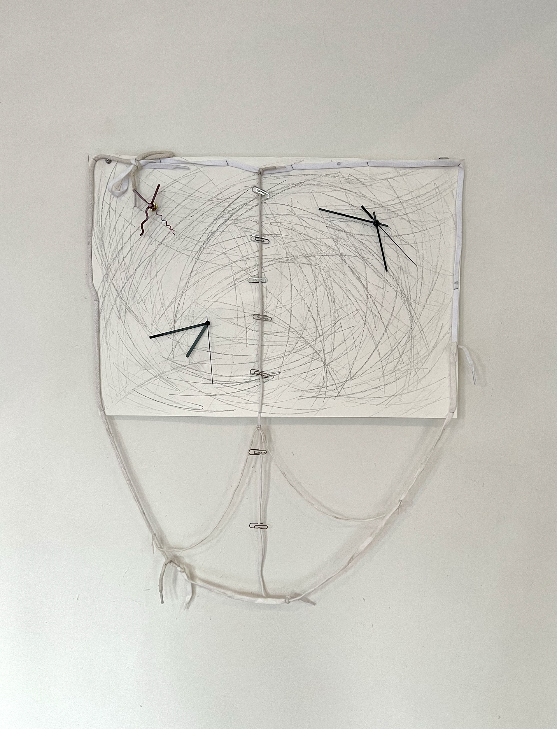 Brayden Van Meurs, <em>I can’t afford to visit Paris yet. My imagination, however, can take me anywhere. Thank you for this <3</em>, 2022, pencil, shoelaces, staples, clock mechanisms and paperclips on paper, 59.4cm x 75cm. Image courtesy of Suite7a