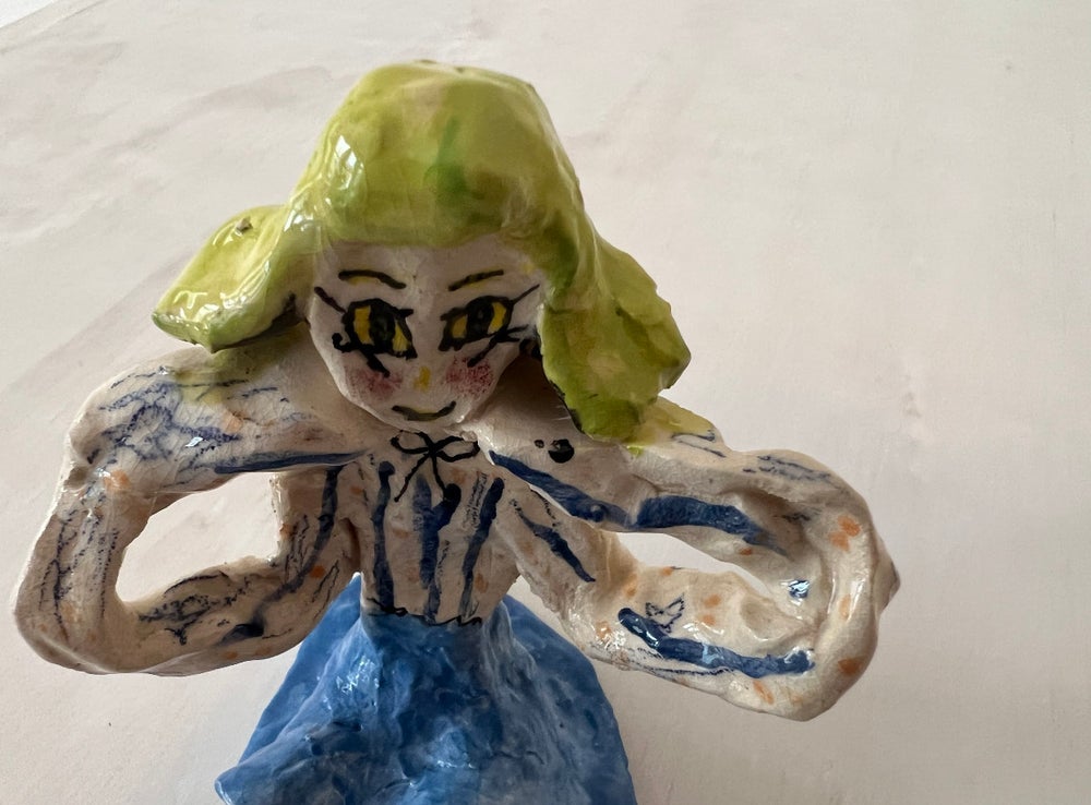 Luyuan Zhang, <em>Material Girl</em>, 2022, love, earthenware clay, various glaze, 12 cm x 9cm x 11cm. Image courtesy of Suite7a